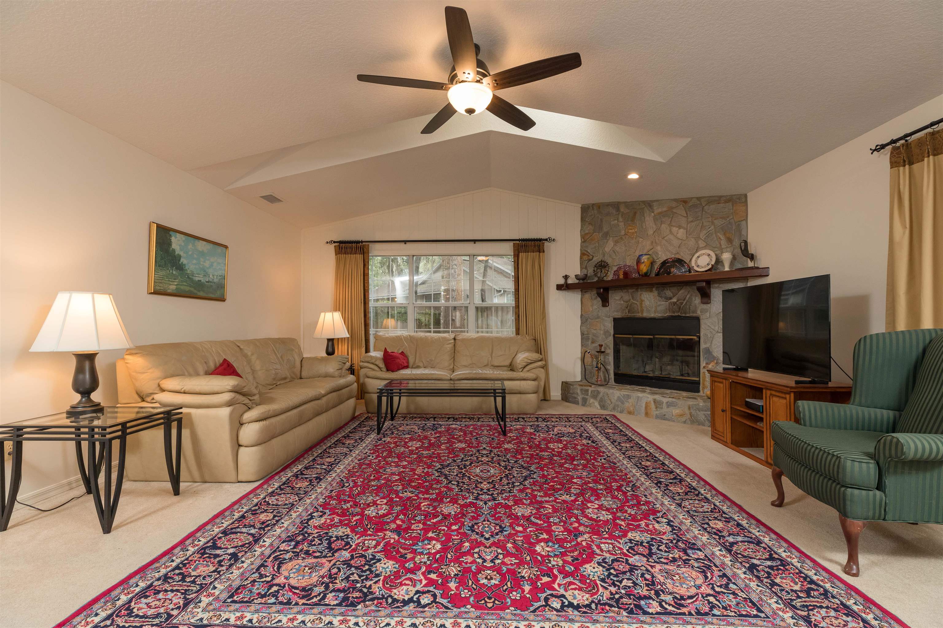 3224 Turtle Creek Road St. Augustine, FL 32086 - Photo 10 of 44 a living room with furniture and a fireplace