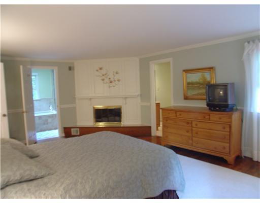 504 Beaver Road Edgeworth, PA 15143 - Photo 8 of 18 Master Bedroom. hardwood floors, corner fireplace,ensuite bath, two walk-in closets