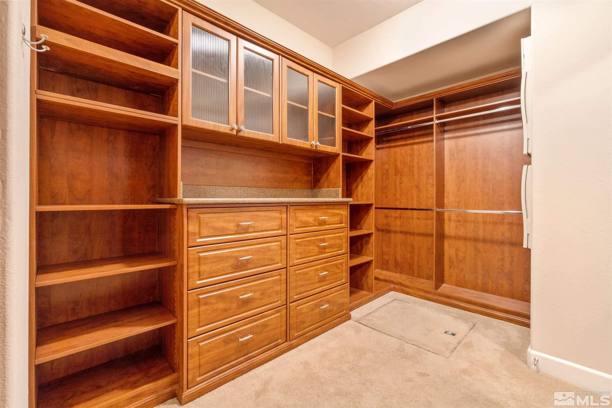 2630 Strathmore Court Reno, NV 89521 - Photo 15 of 40 a view of walk in closet with empty racks