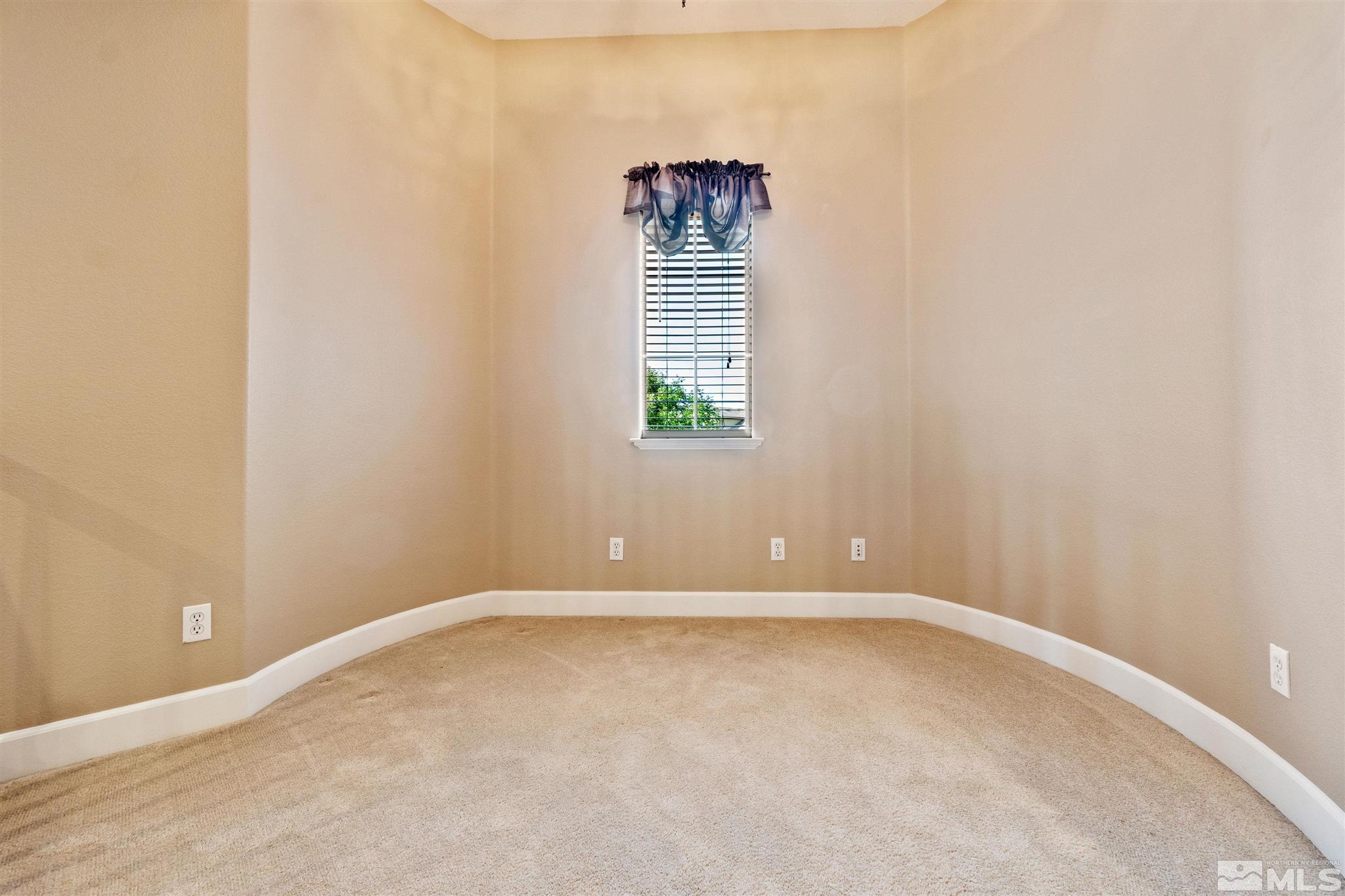 2630 Strathmore Court Reno, NV 89521 - Photo 26 of 40 an empty room with windows