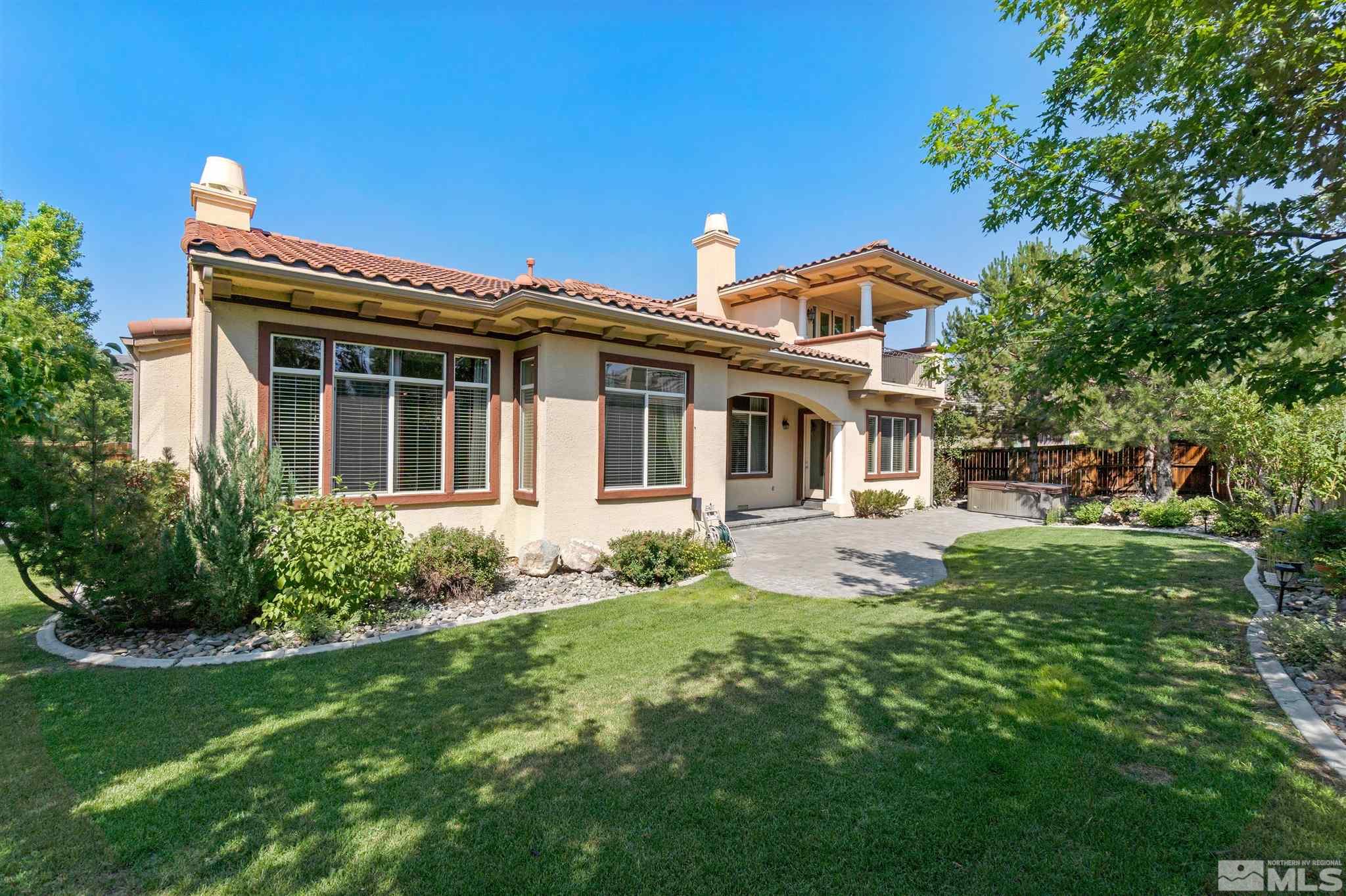 2630 Strathmore Court Reno, NV 89521 - Photo 35 of 40 a front view of a house with a yard