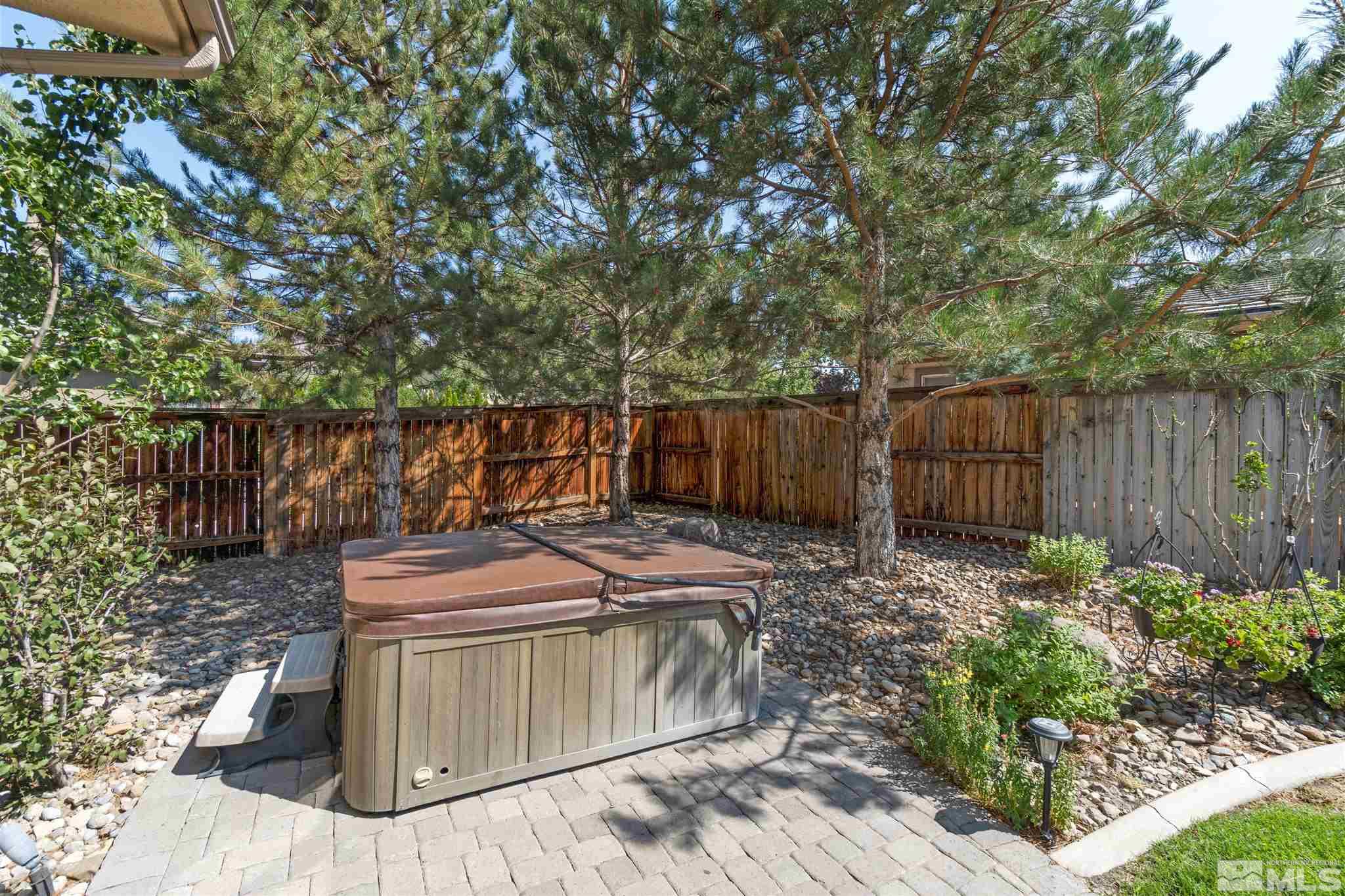 2630 Strathmore Court Reno, NV 89521 - Photo 36 of 40 a view of a backyard with wooden fence