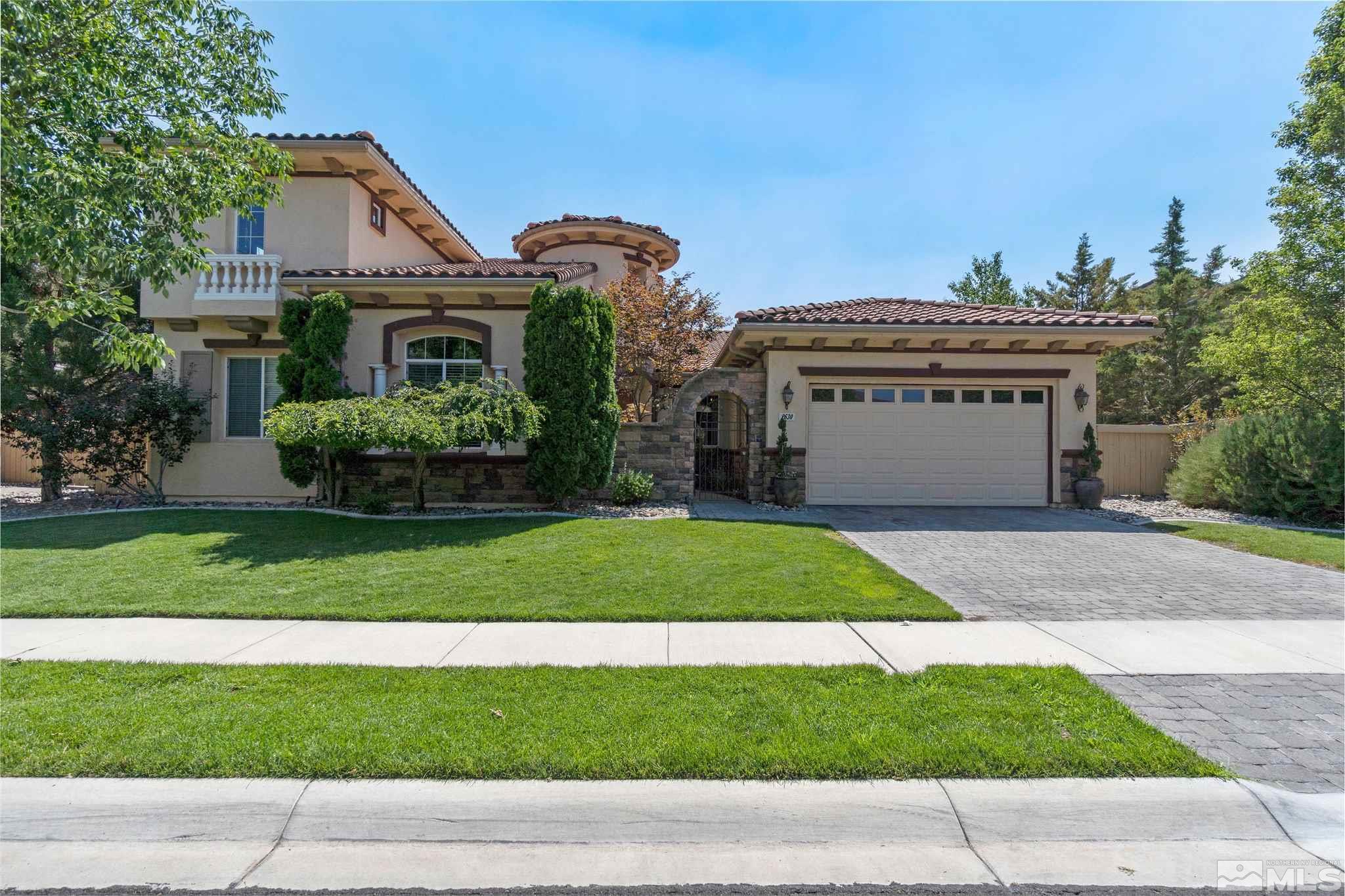 2630 Strathmore Court Reno, NV 89521 - Photo 40 of 40 a front view of a house with a garden