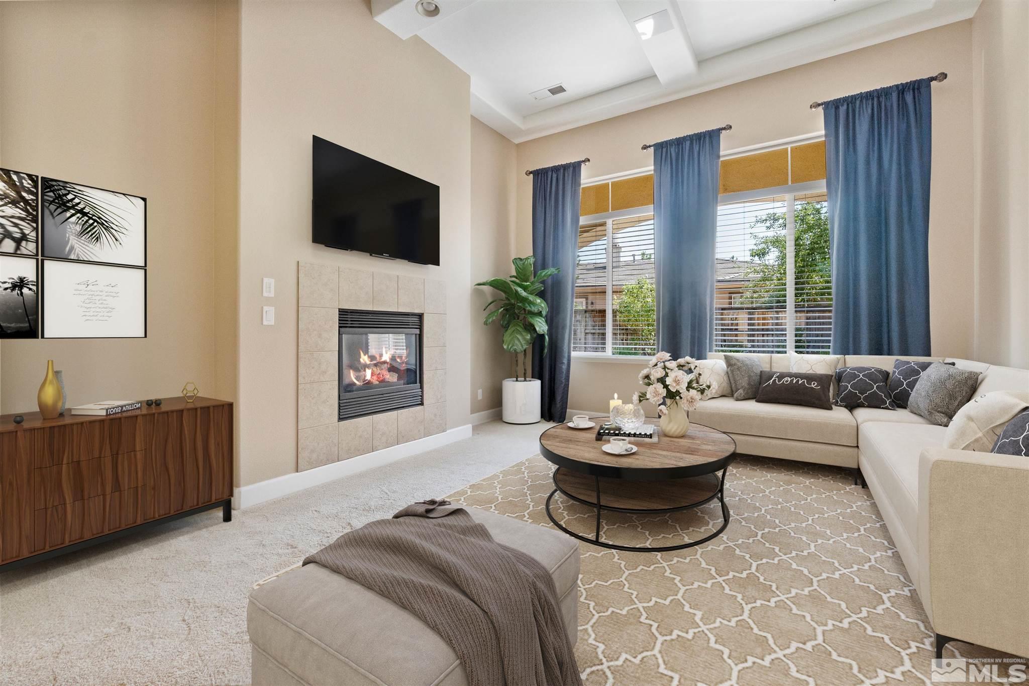 2630 Strathmore Court Reno, NV 89521 - Photo 5 of 40 a living room with furniture and a fireplace