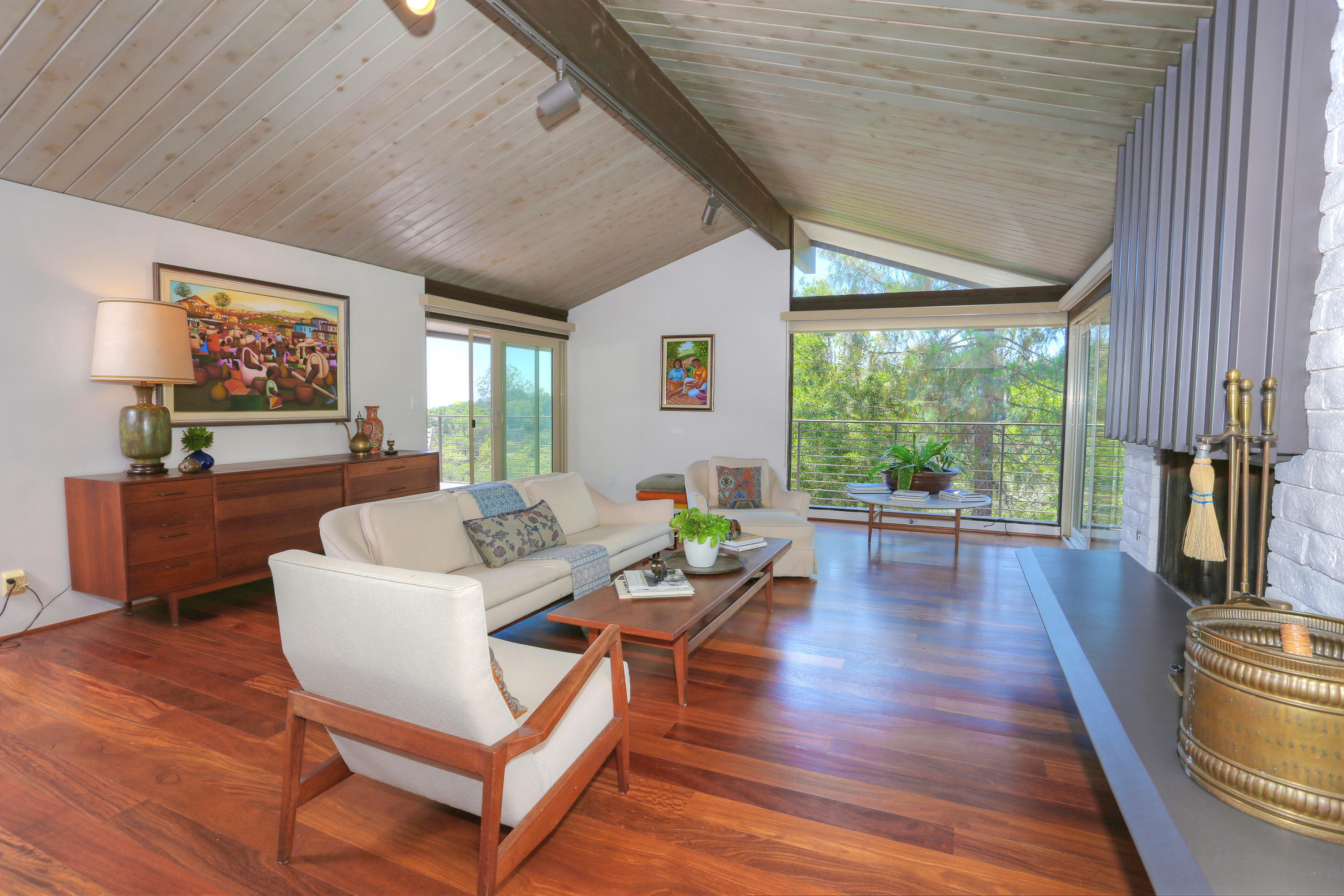 2261 Las Canoas Road Santa Barbara, CA 93105 - Photo 2 of 42 a living room with furniture a large window wooden floor and a rug