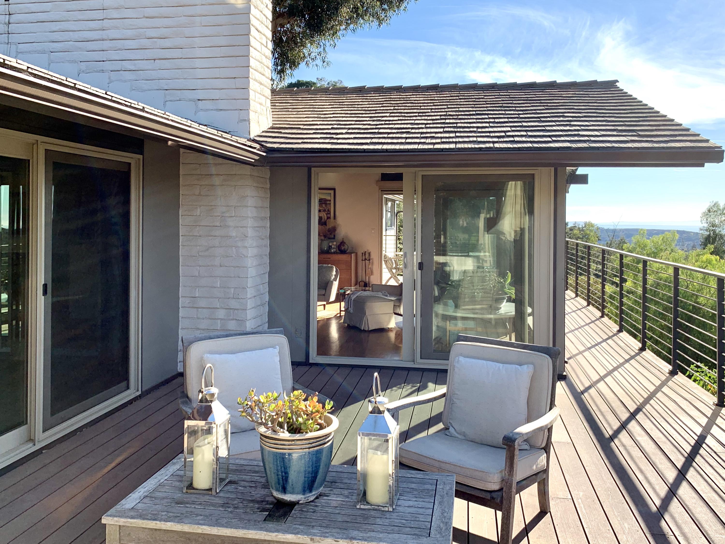 2261 Las Canoas Road Santa Barbara, CA 93105 - Photo 4 of 42 a view of a chair and tables in the balcony
