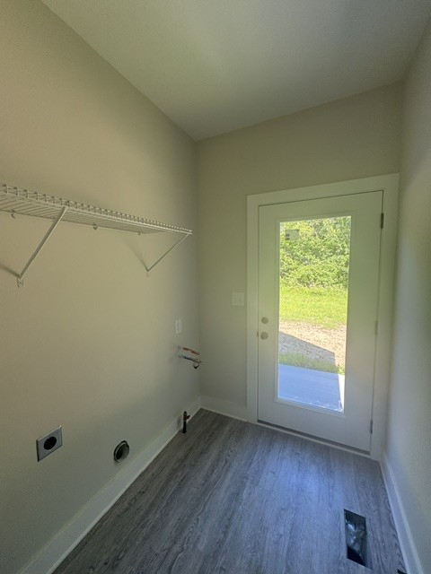 422 Shady Hill Road Dickson, TN 37055 - Photo 15 of 15 a view of a room that has wooden floor and exposed radiator