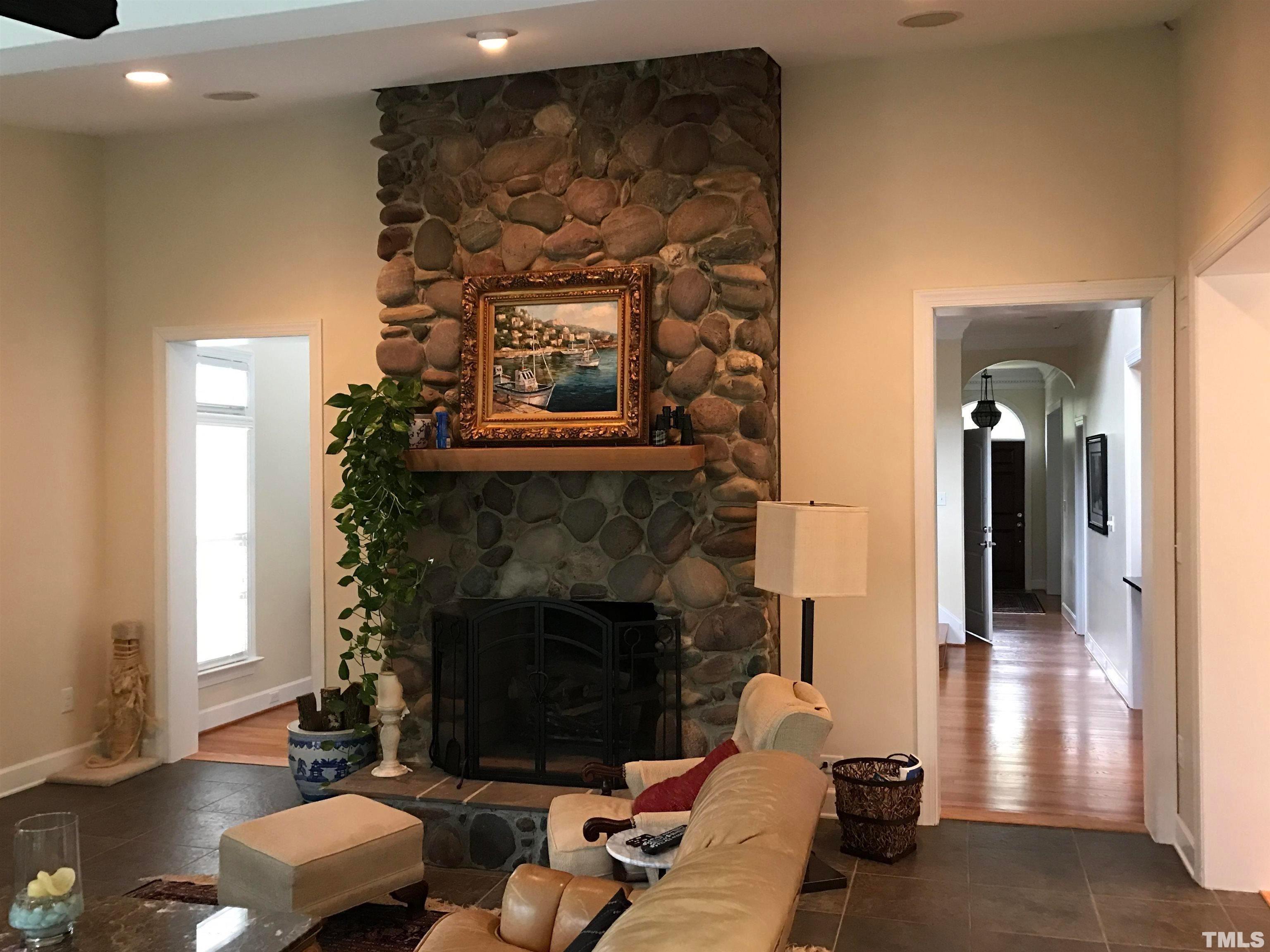 3309 Darien Drive Raleigh, NC 27607 - Photo 3 of 7 a living room with furniture and a fireplace