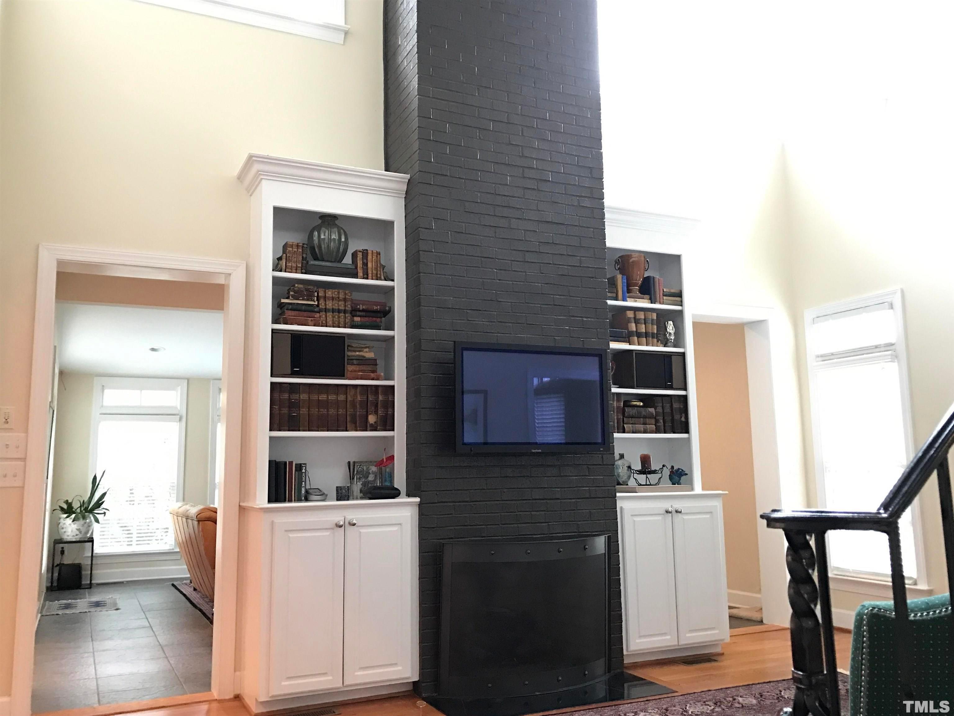 3309 Darien Drive Raleigh, NC 27607 - Photo 5 of 7 a hallway with cabinets and a window
