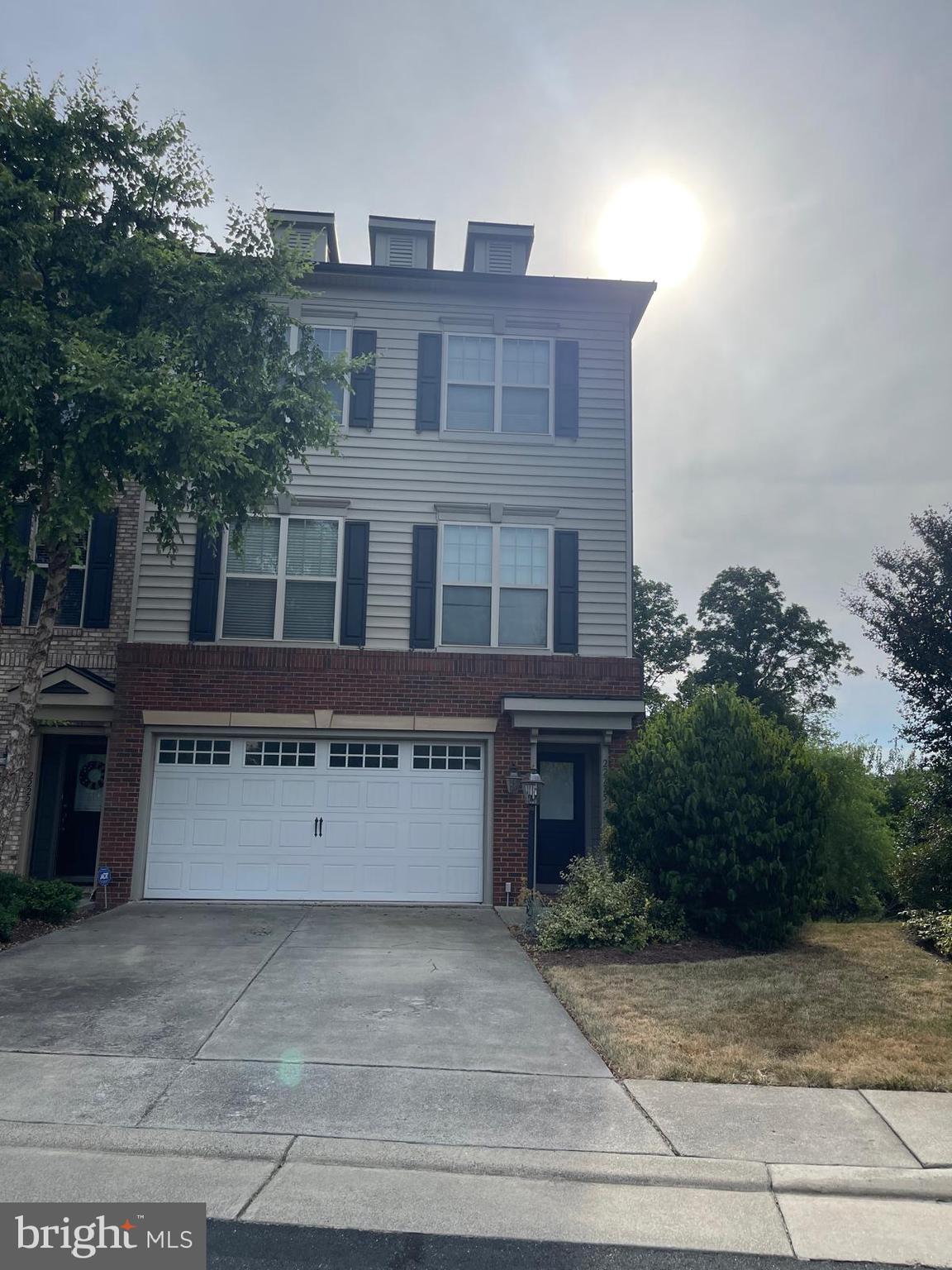 22225 Falling Terrace Ashburn, VA 20148 - Photo 2 of 30 a view of a building with a garden and pathway