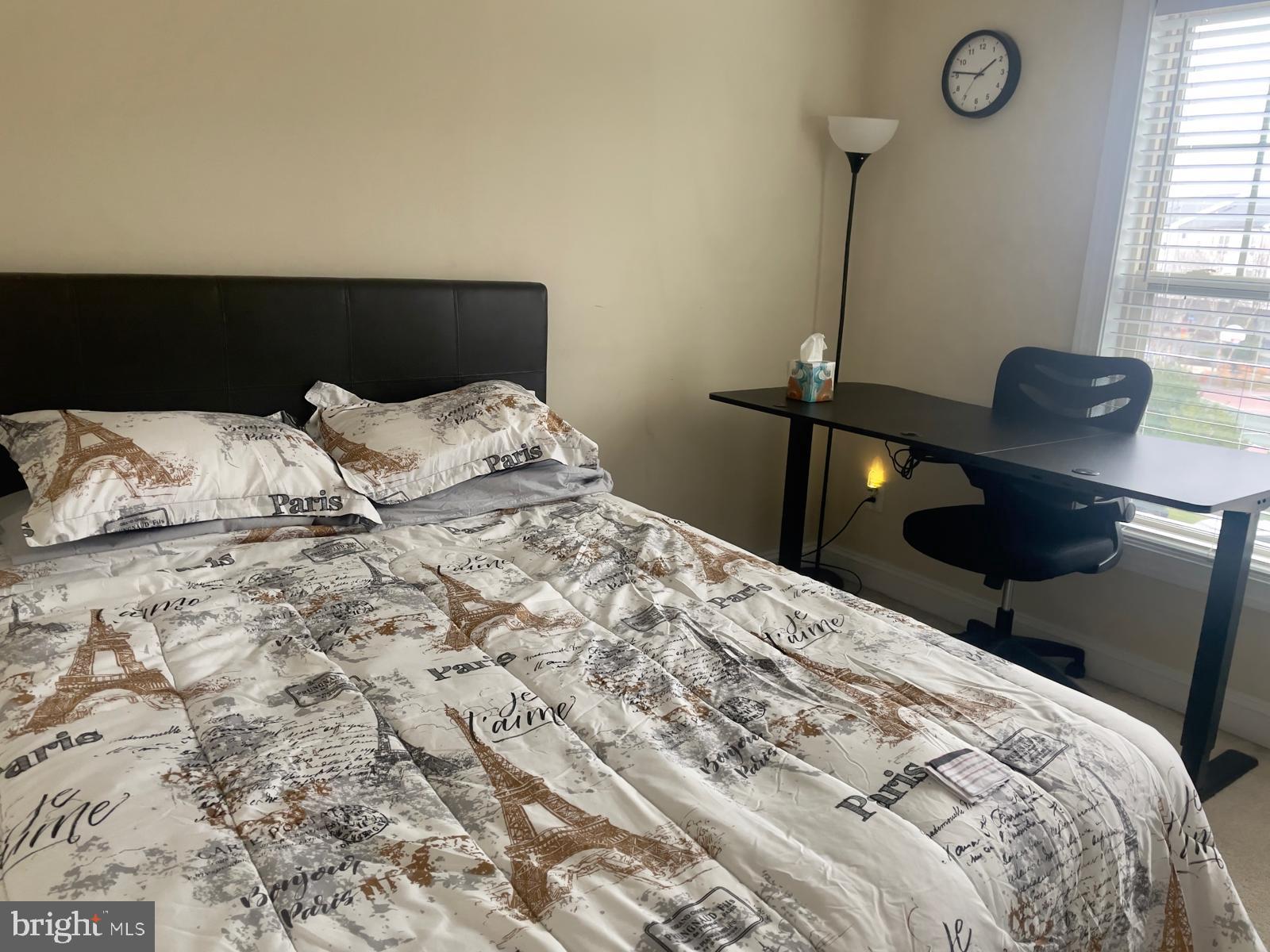 22225 Falling Terrace Ashburn, VA 20148 - Photo 21 of 30 a bedroom with a bed and a window