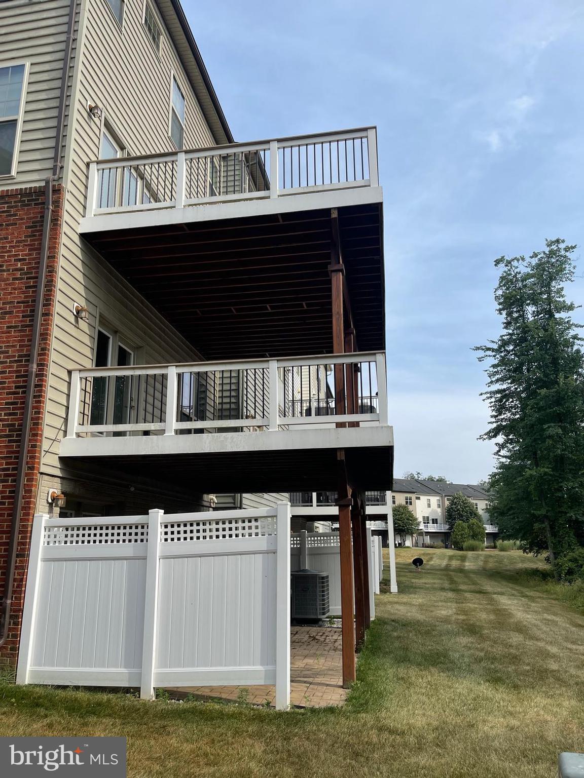 22225 Falling Terrace Ashburn, VA 20148 - Photo 28 of 30 a view of a house with a balcony