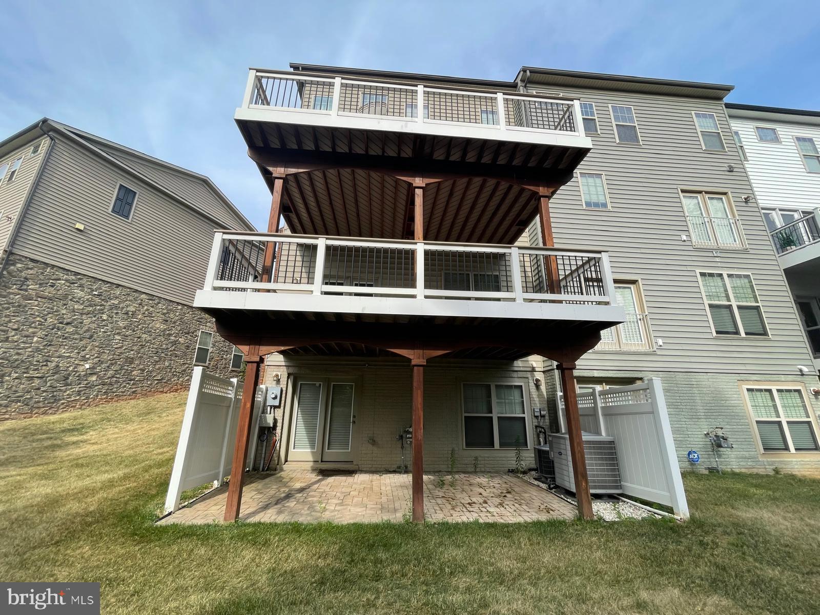 22225 Falling Terrace Ashburn, VA 20148 - Photo 29 of 30 a front view of a house with a yard