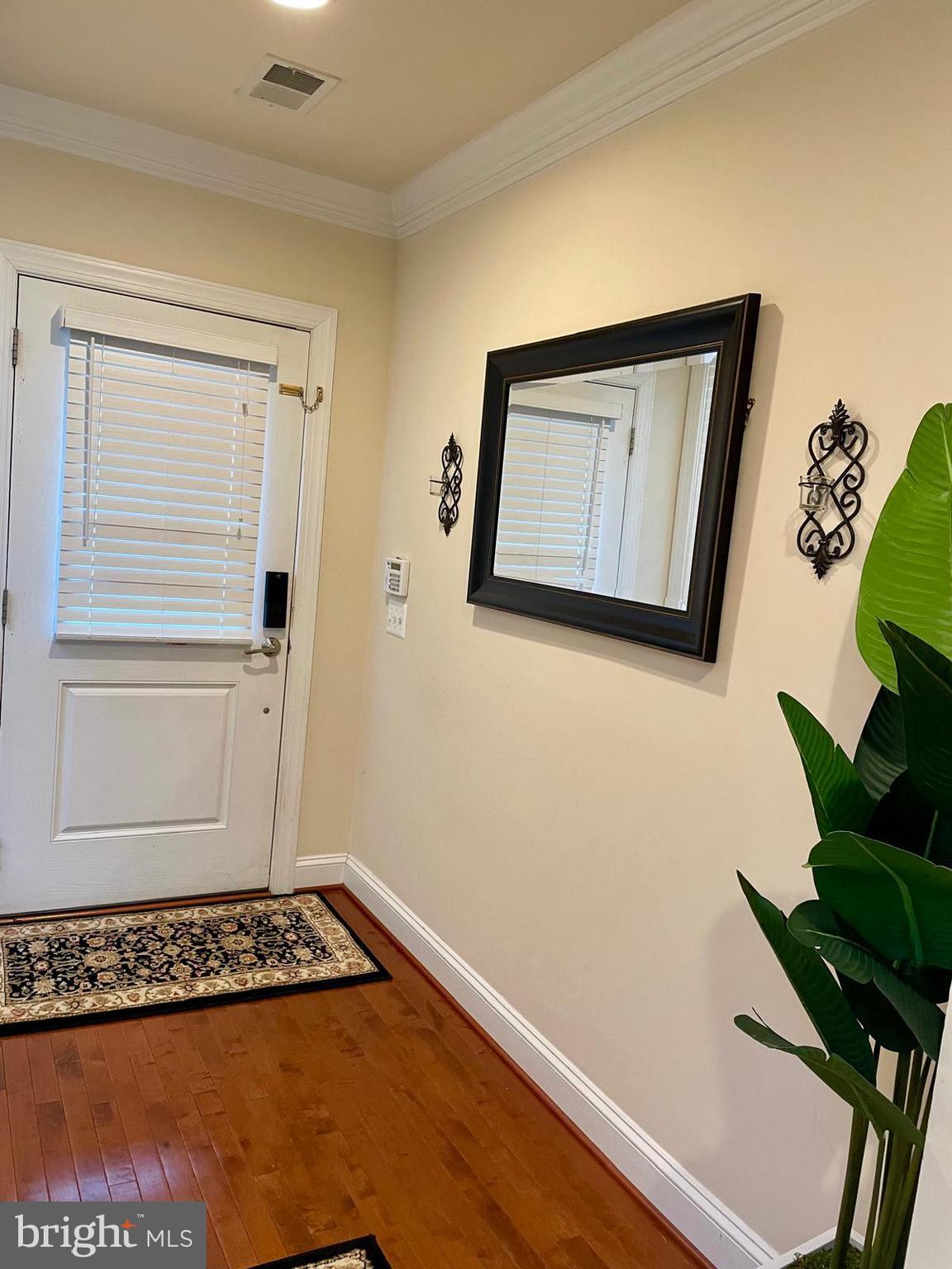 22225 Falling Terrace Ashburn, VA 20148 - Photo 3 of 30 a view of wooden floor in a room