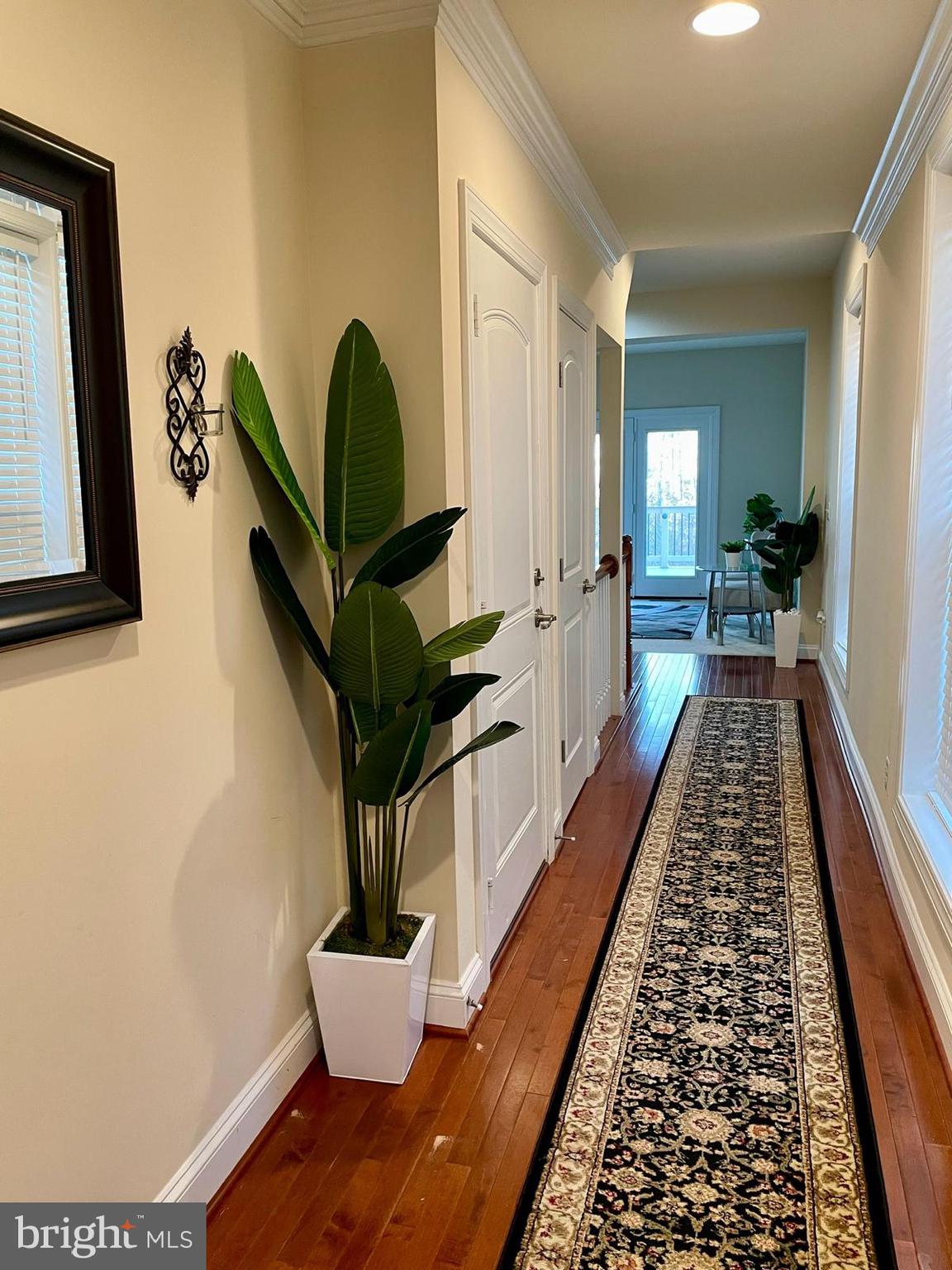 22225 Falling Terrace Ashburn, VA 20148 - Photo 7 of 30 a hallway with a large window