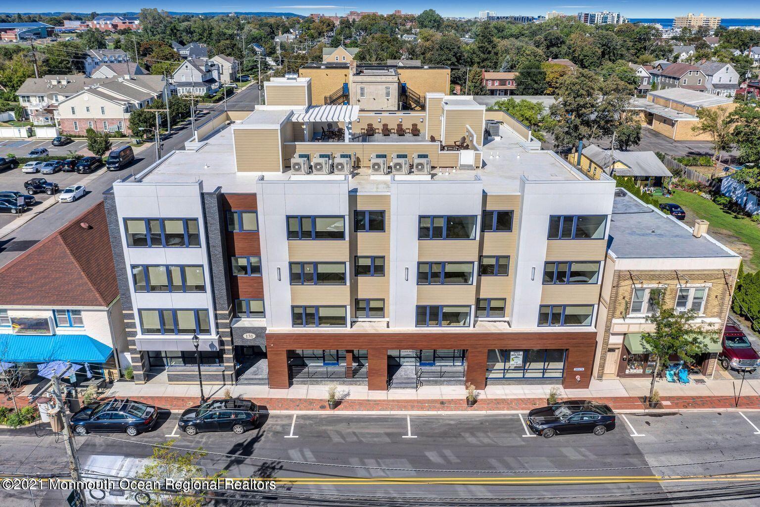 131 Brighton Avenue, Unit 208 Long Branch, NJ 07740 - Photo 28 of 30 a front view of a building with street view