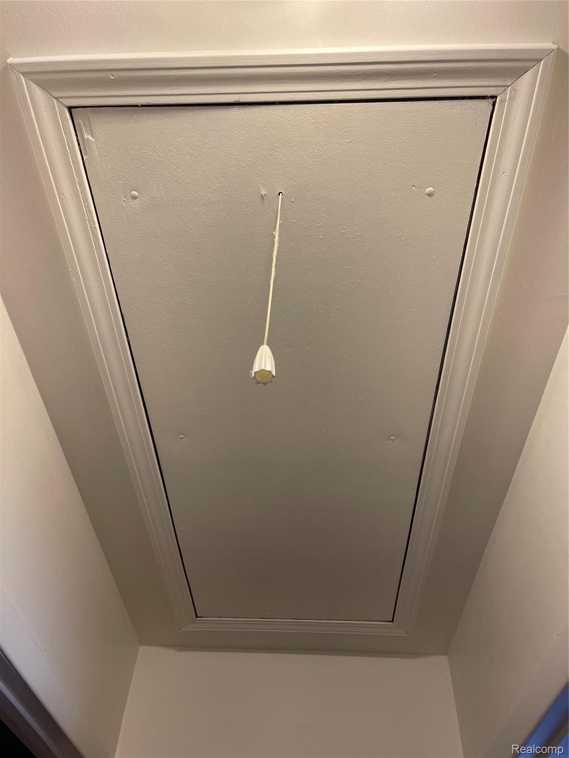 2700 East Wardlow Road Highland, MI 48356 - Photo 27 of 30 WARDLOW ATTIC PULL DOWN STORAGE.jpg
