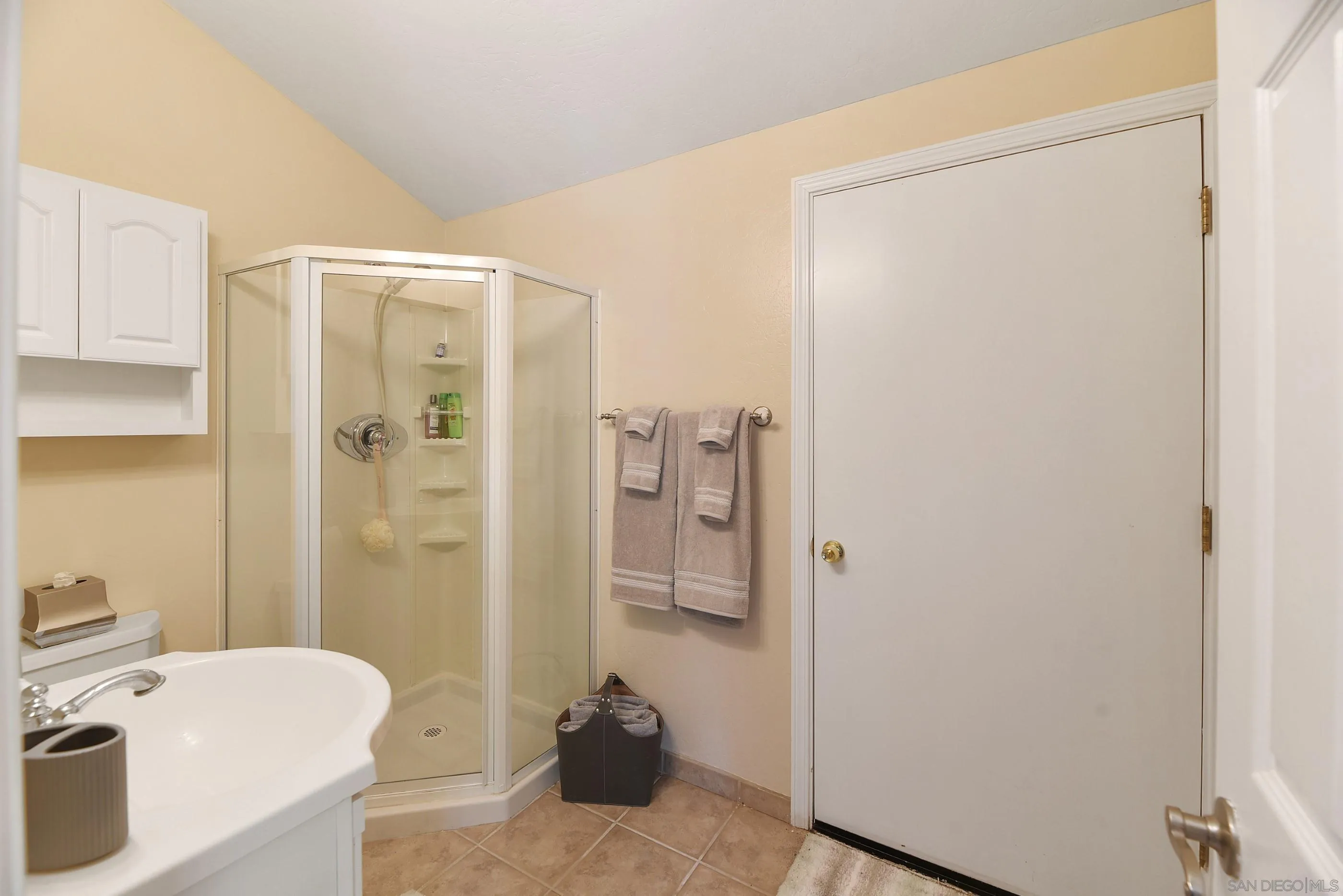 12963 Glen Circle Road Poway, CA 92064 - Photo 24 of 75 a bathroom with a sink and a shower