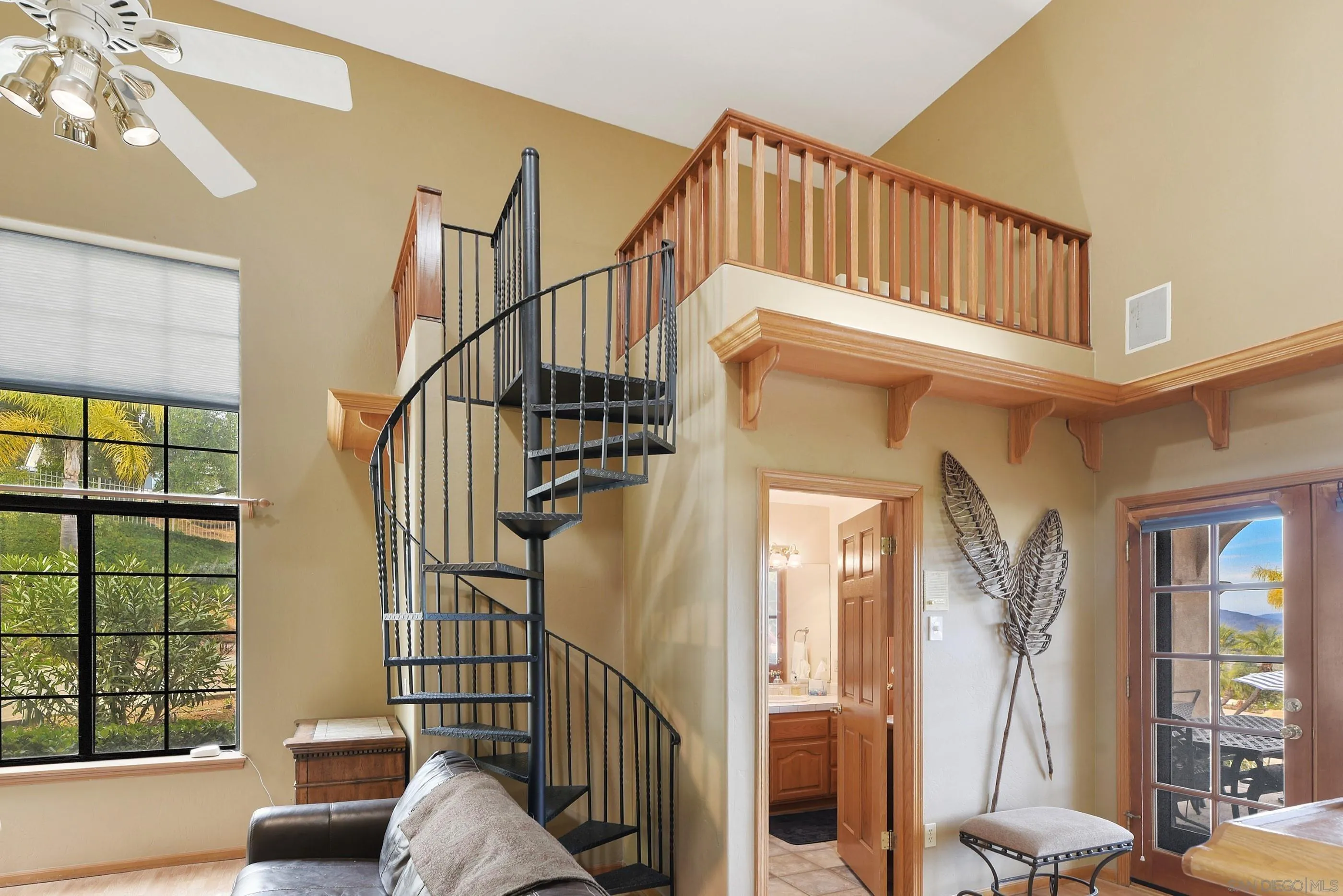 12963 Glen Circle Road Poway, CA 92064 - Photo 53 of 75 a view of staircase with furniture and windows