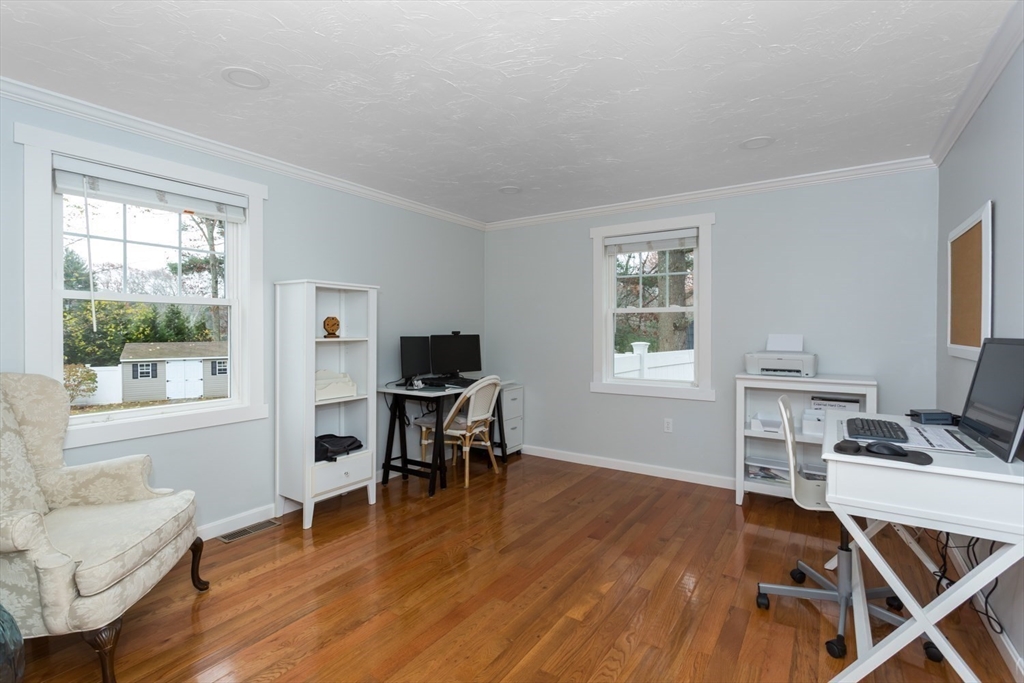 7 Glenwood Road Franklin, MA 02038 - Photo 16 of 46 a workspace with wooden floor and a window