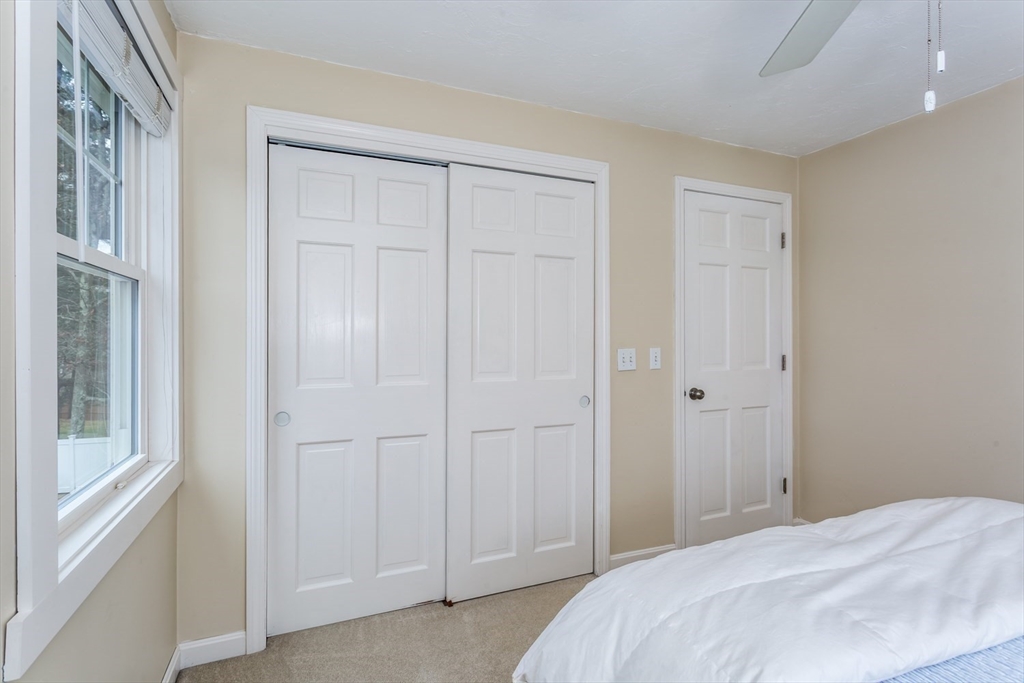 7 Glenwood Road Franklin, MA 02038 - Photo 25 of 46 a bedroom with a bed and a window