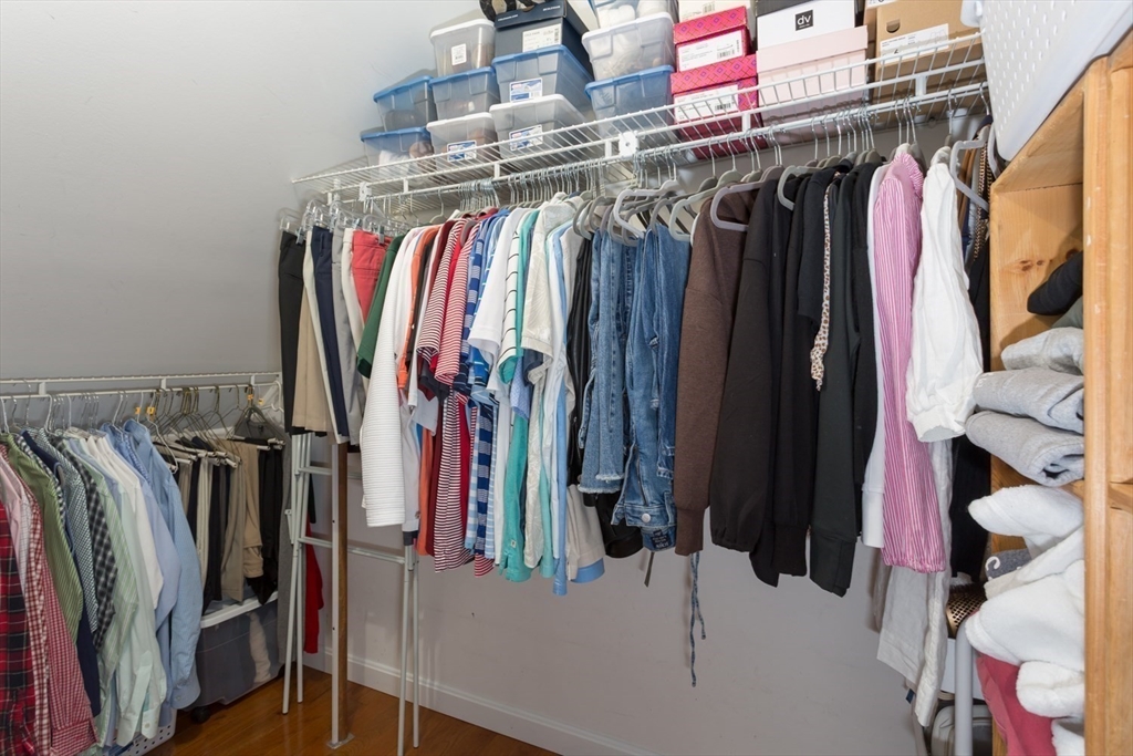 7 Glenwood Road Franklin, MA 02038 - Photo 28 of 46 a view of walk in closet with clothes