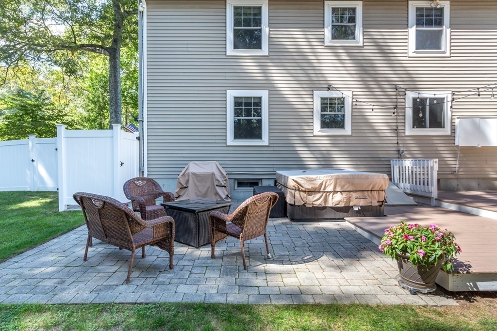 7 Glenwood Road Franklin, MA 02038 - Photo 35 of 46 a backyard of a house with yard fire pit and outdoor seating