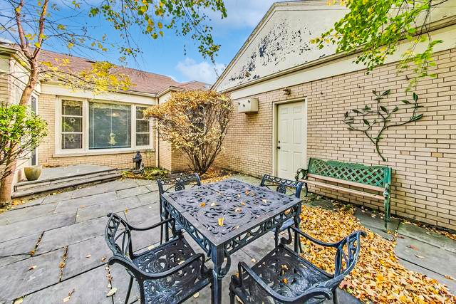 701 East Avenue Park Ridge, IL 60068 - Photo 34 of 37 front view of a house with a chairs