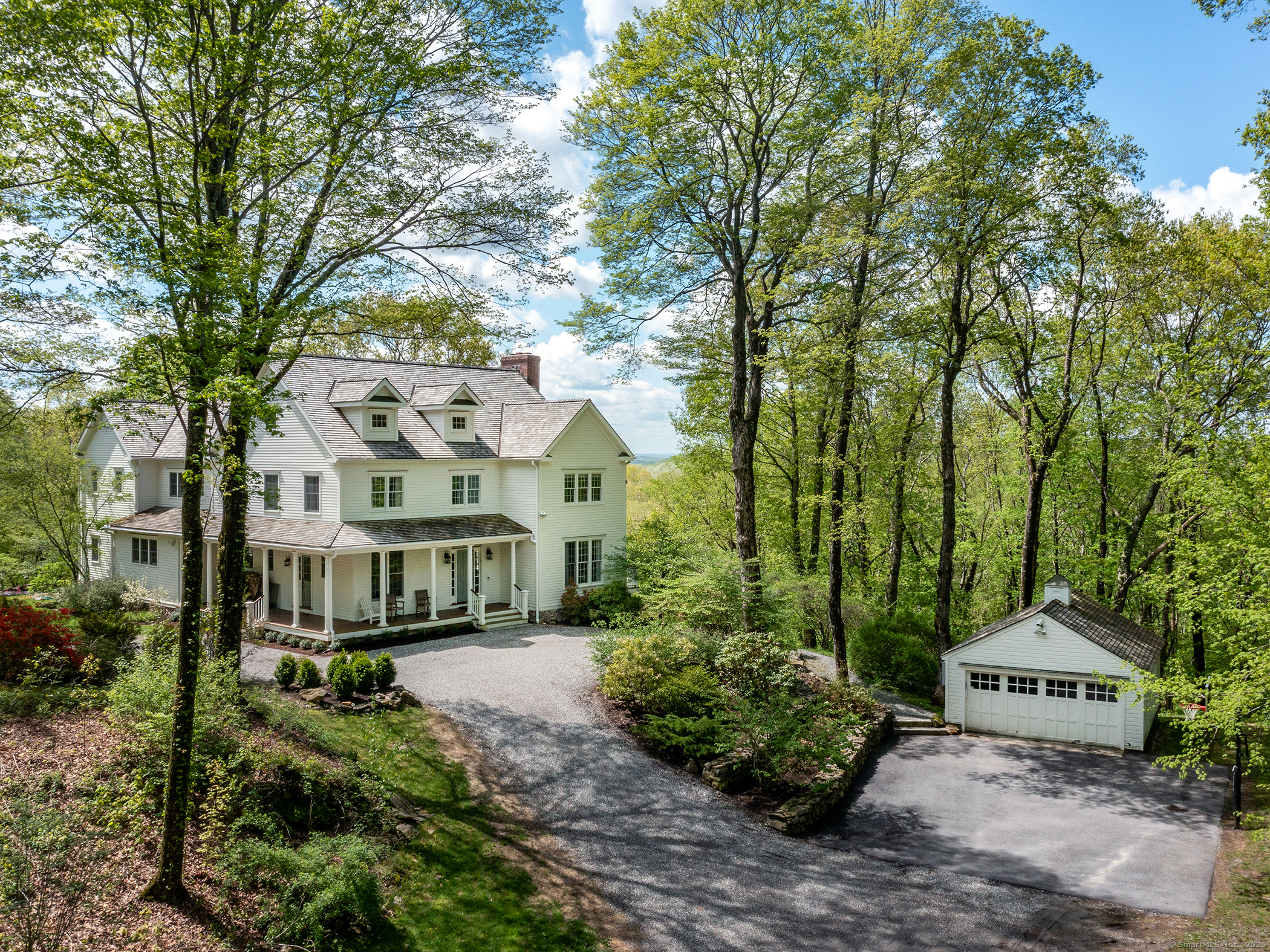 a view of a street with palm trees