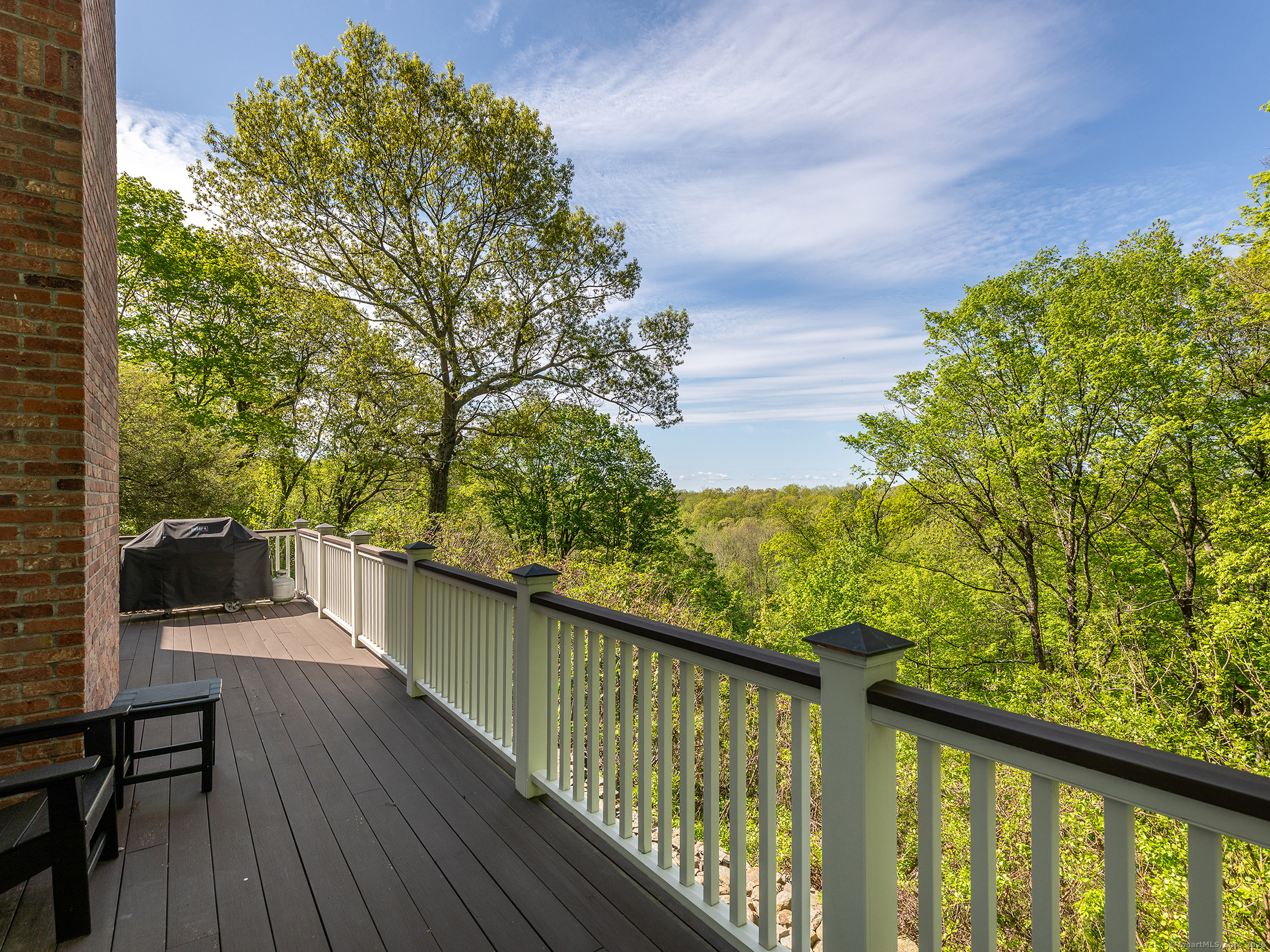 143 Tophet Road Roxbury, CT 06783 - Photo 14 of 40 a balcony with wooden floor and fence