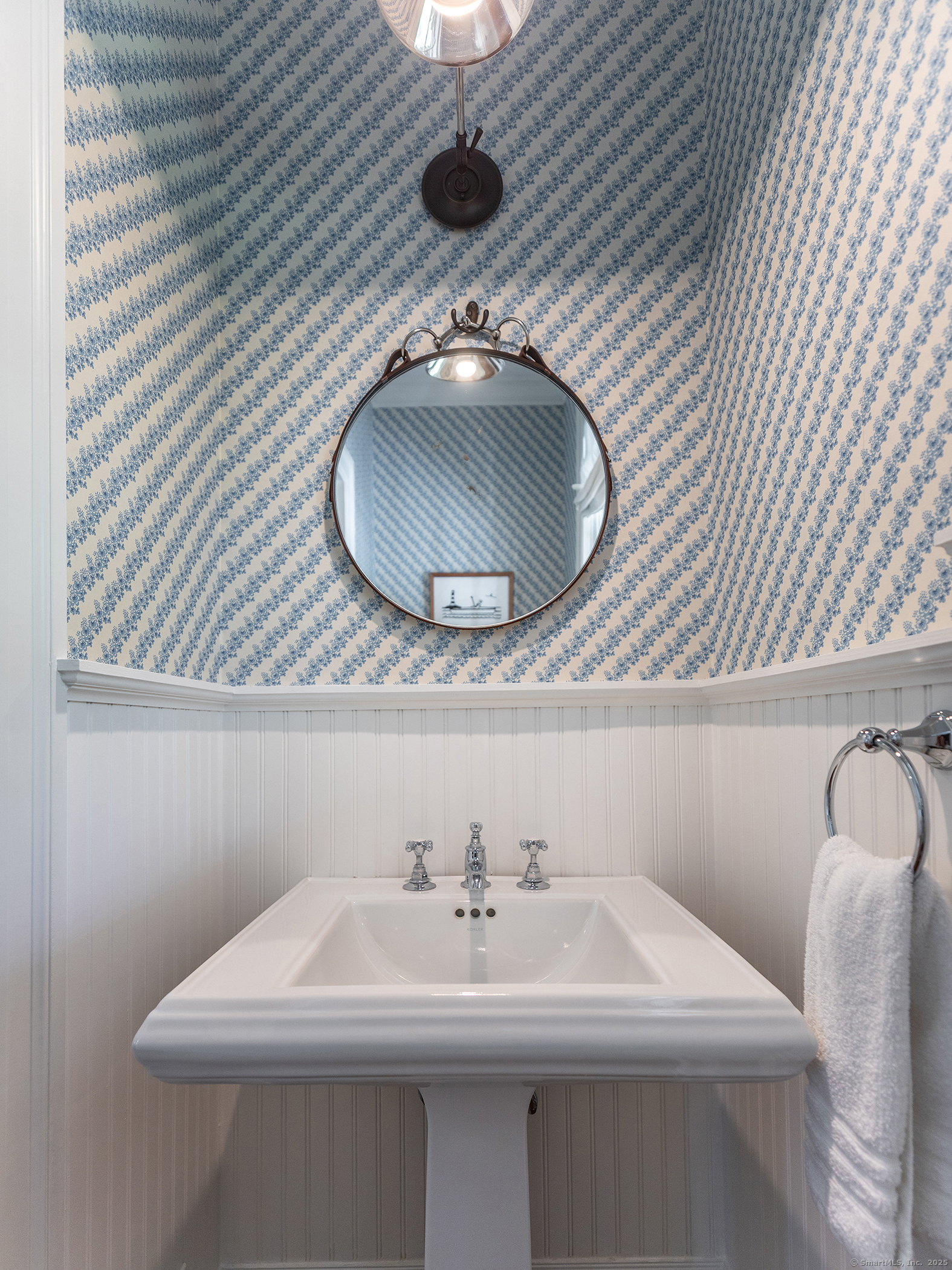 143 Tophet Road Roxbury, CT 06783 - Photo 16 of 40 a bathroom with a sink a mirror and vanity