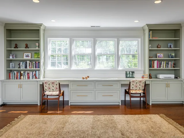 a room with furniture and a window