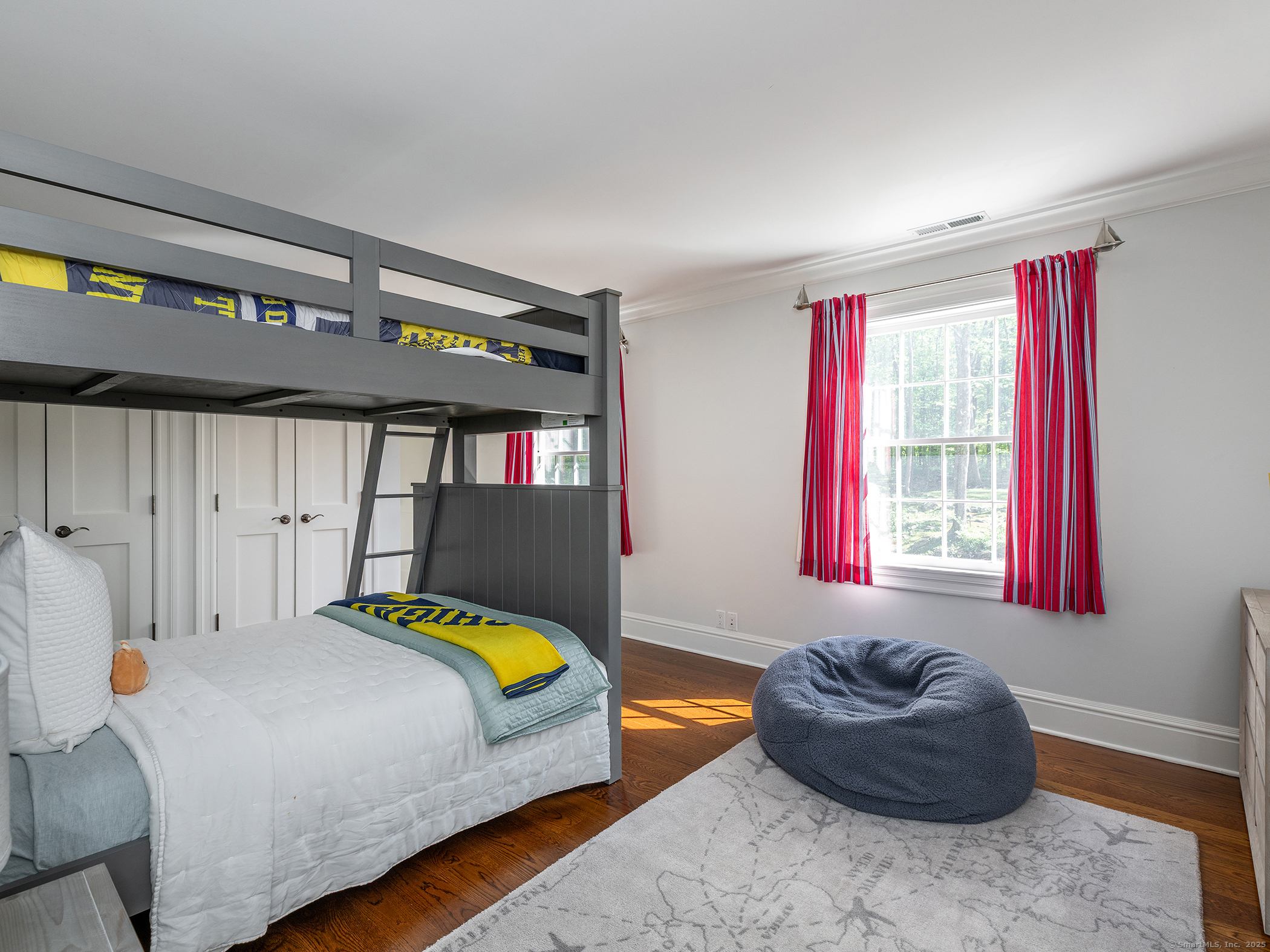 143 Tophet Road Roxbury, CT 06783 - Photo 25 of 40 a bedroom with a bed and a couch