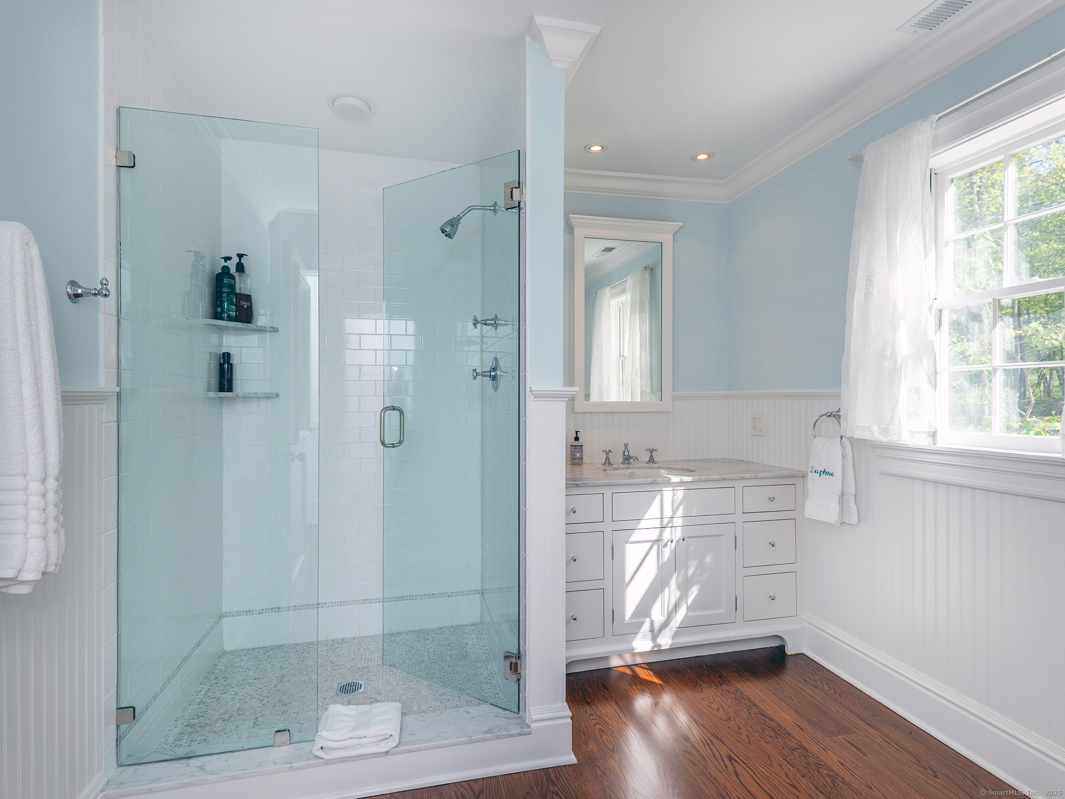 143 Tophet Road Roxbury, CT 06783 - Photo 26 of 40 a bathroom with a glass shower door and a window