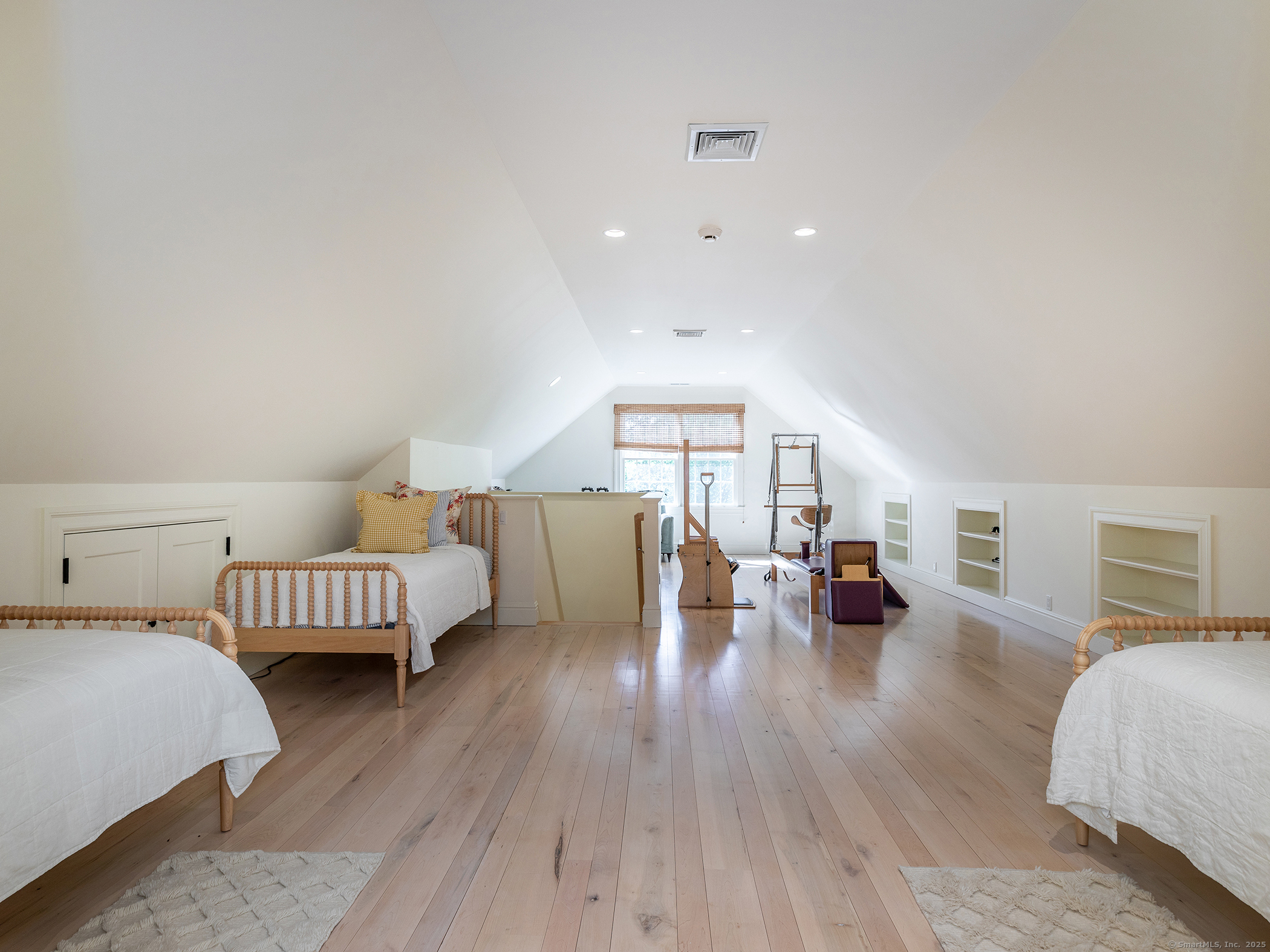 143 Tophet Road Roxbury, CT 06783 - Photo 27 of 40 a living room with furniture and a dining table with wooden floor