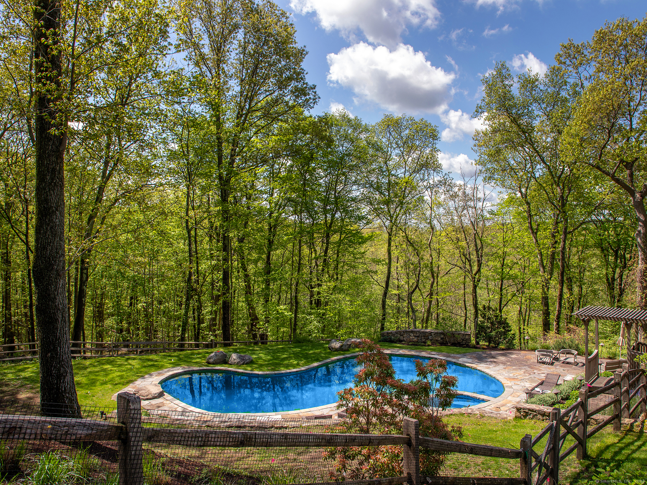 143 Tophet Road Roxbury, CT 06783 - Photo 29 of 40 a view of a swimming pool with a patio