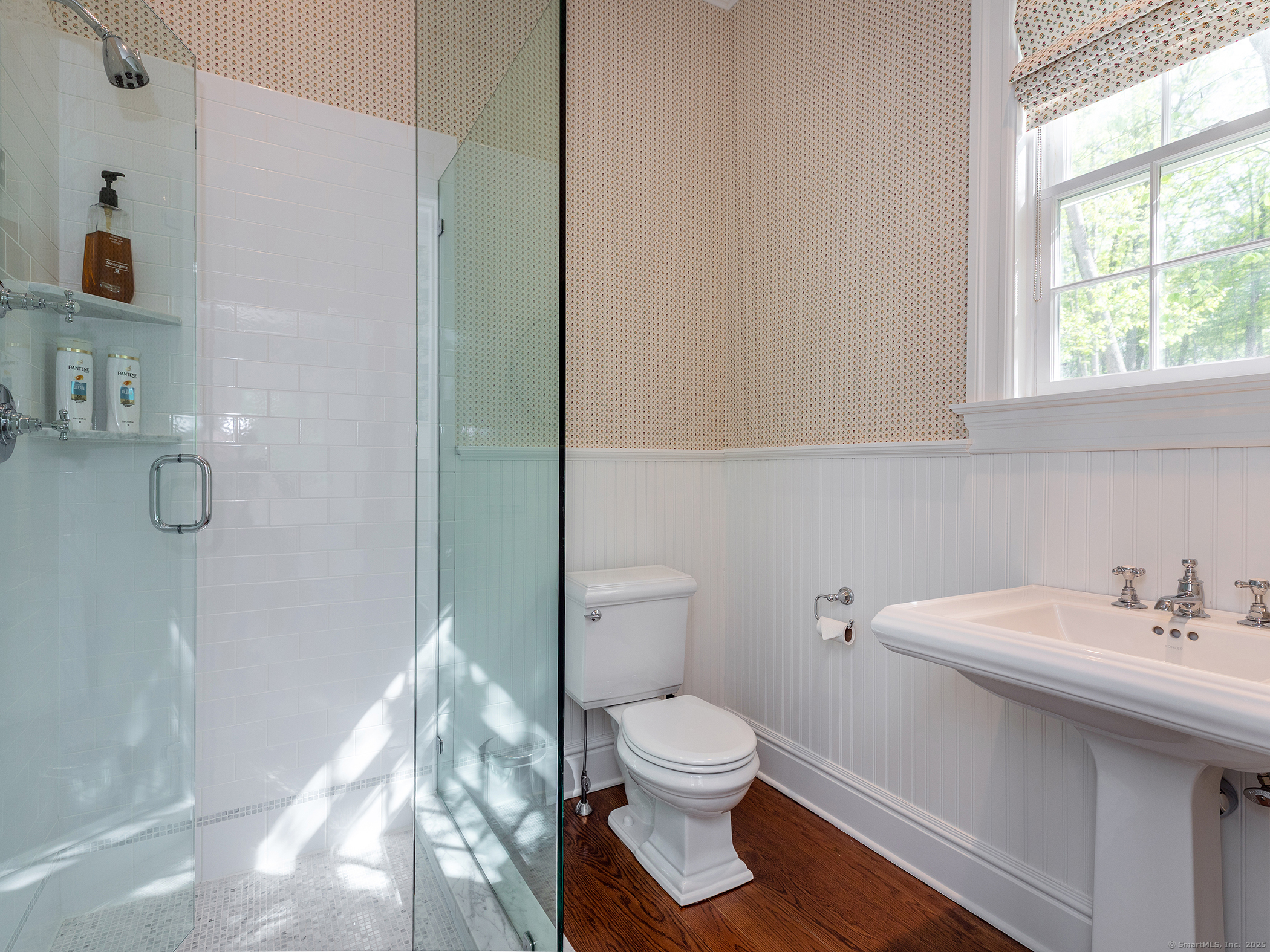 143 Tophet Road Roxbury, CT 06783 - Photo 33 of 40 a white toilet sitting next to a bathroom sink