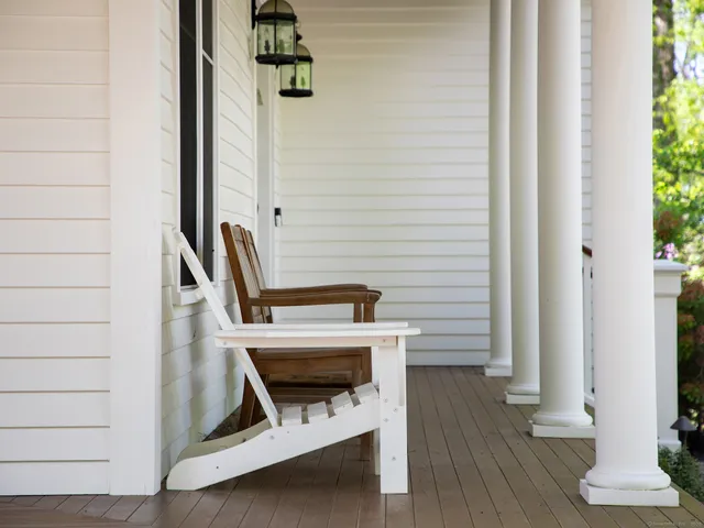 a view of an entryway with wooden floor