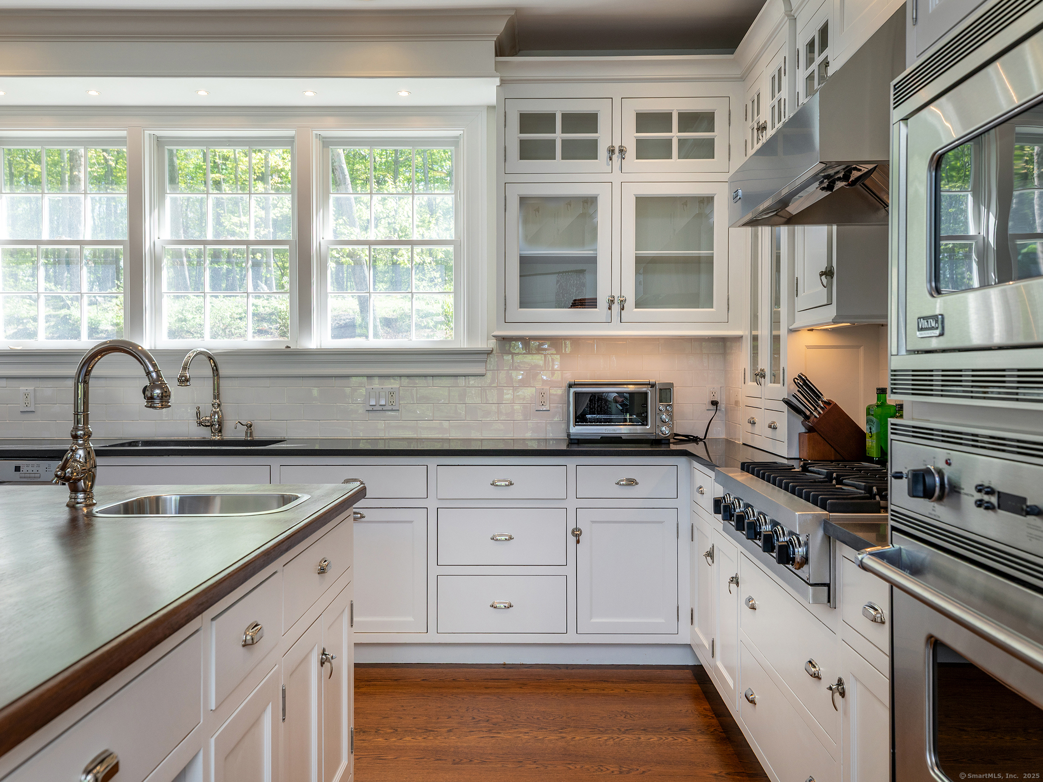 143 Tophet Road Roxbury, CT 06783 - Photo 6 of 40 a kitchen with cabinets appliances and a window