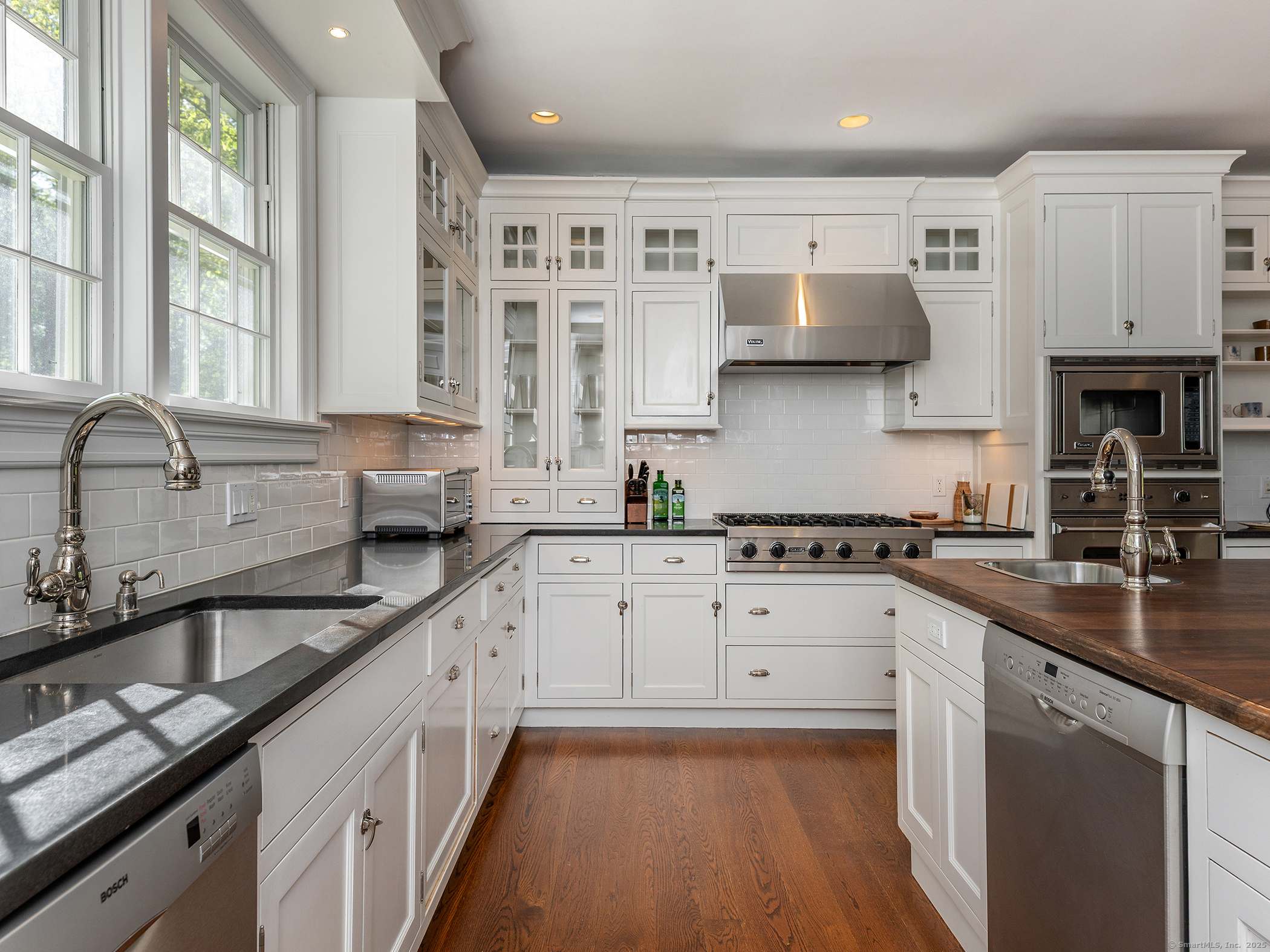 143 Tophet Road Roxbury, CT 06783 - Photo 7 of 40 a kitchen with a sink stove and cabinets