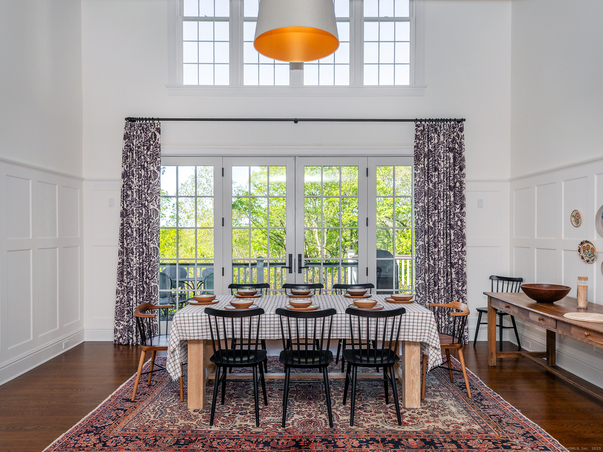 143 Tophet Road Roxbury, CT 06783 - Photo 10 of 40 a view of a dining room with furniture and chandelier