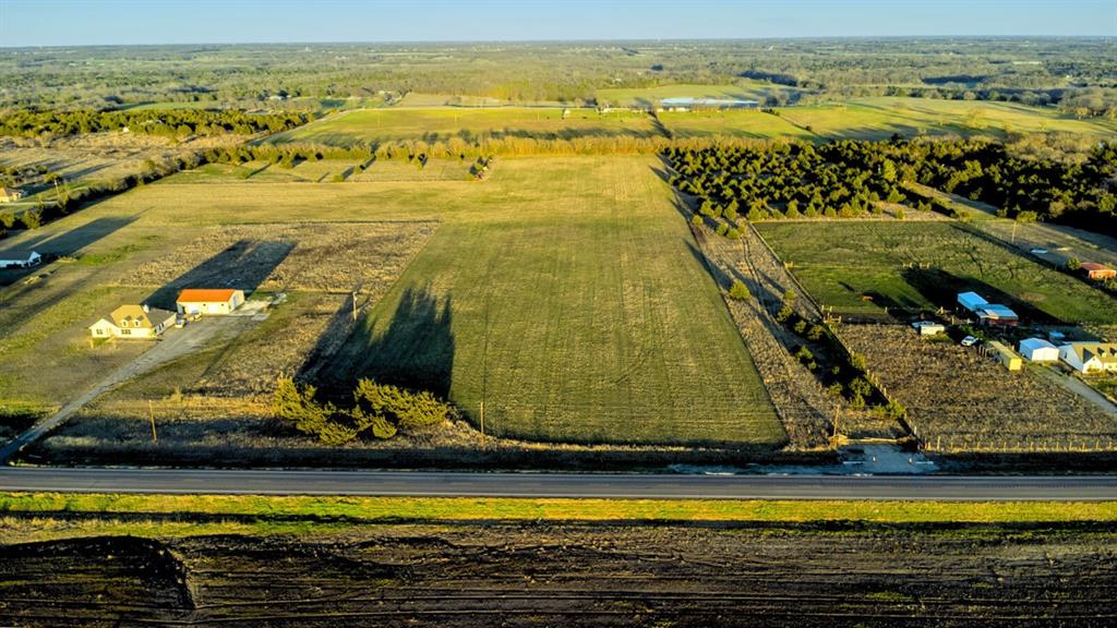 0 Fm-3133 Anna, TX 75409 - Photo 5 of 8 a view of a swimming pool with an ocean view