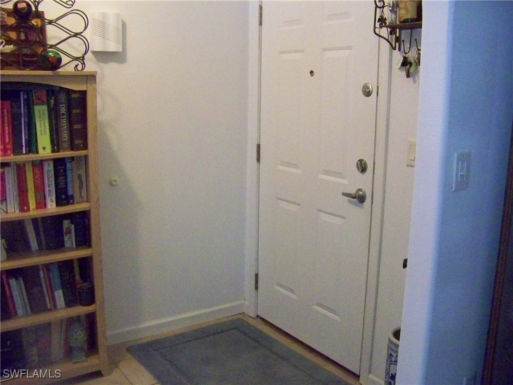 15550 Burnt Store Road, Unit 128 Punta Gorda, FL 33955 - Photo 11 of 50 a view of a hallway with closet