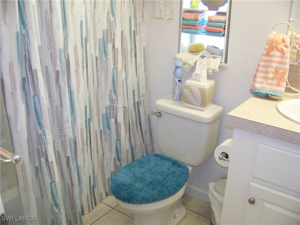15550 Burnt Store Road, Unit 128 Punta Gorda, FL 33955 - Photo 36 of 50 a bathroom with a sink and a toilet