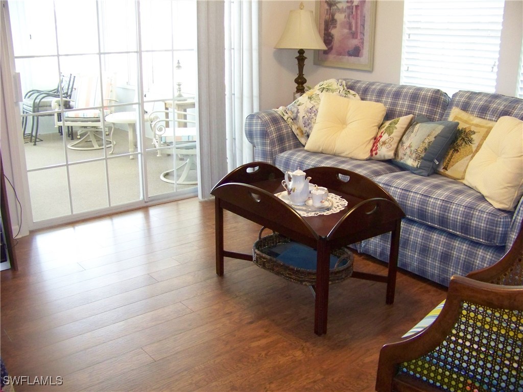 15550 Burnt Store Road, Unit 128 Punta Gorda, FL 33955 - Photo 40 of 50 a living room with furniture and a window