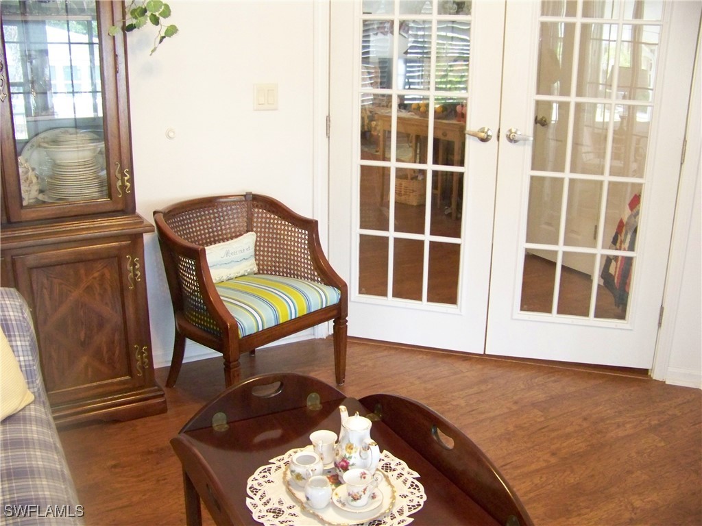 15550 Burnt Store Road, Unit 128 Punta Gorda, FL 33955 - Photo 41 of 50 a living room with furniture and a window