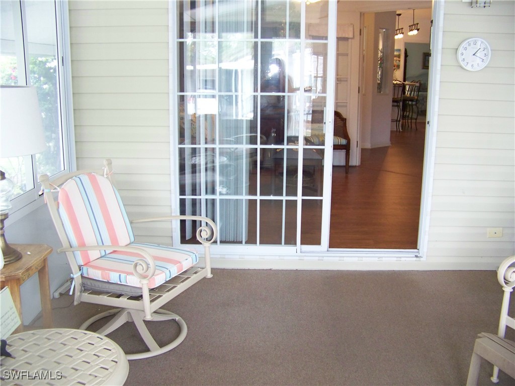 15550 Burnt Store Road, Unit 128 Punta Gorda, FL 33955 - Photo 45 of 50 a view of a room with furniture and windows