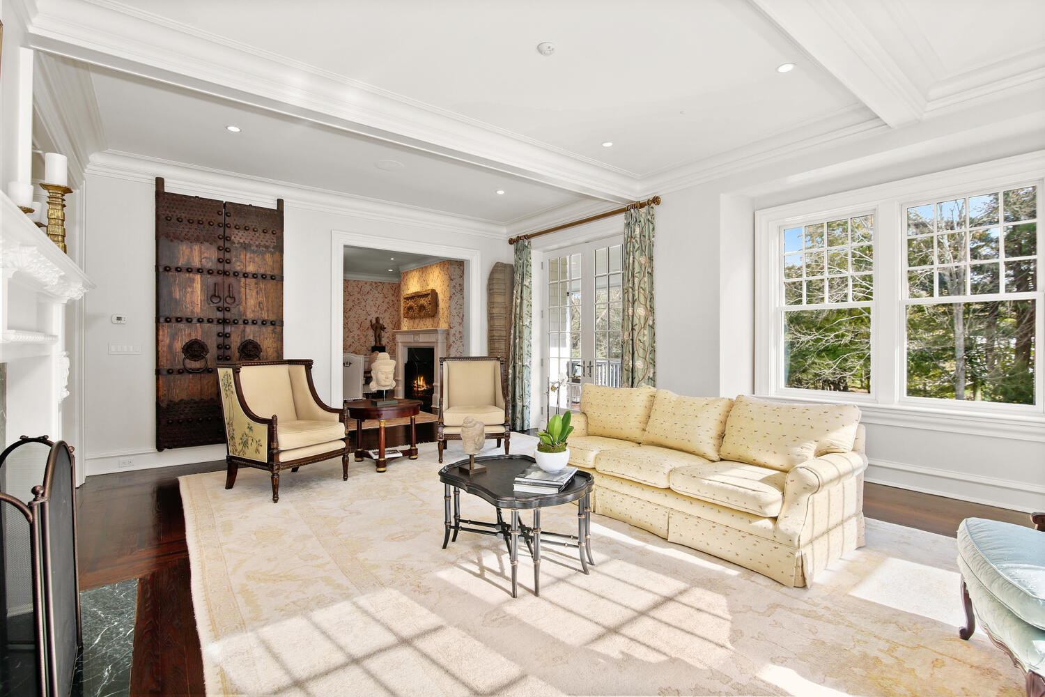 363 West Road New Canaan, CT 06840 - Photo 13 of 68 a living room with furniture and floor to ceiling windows