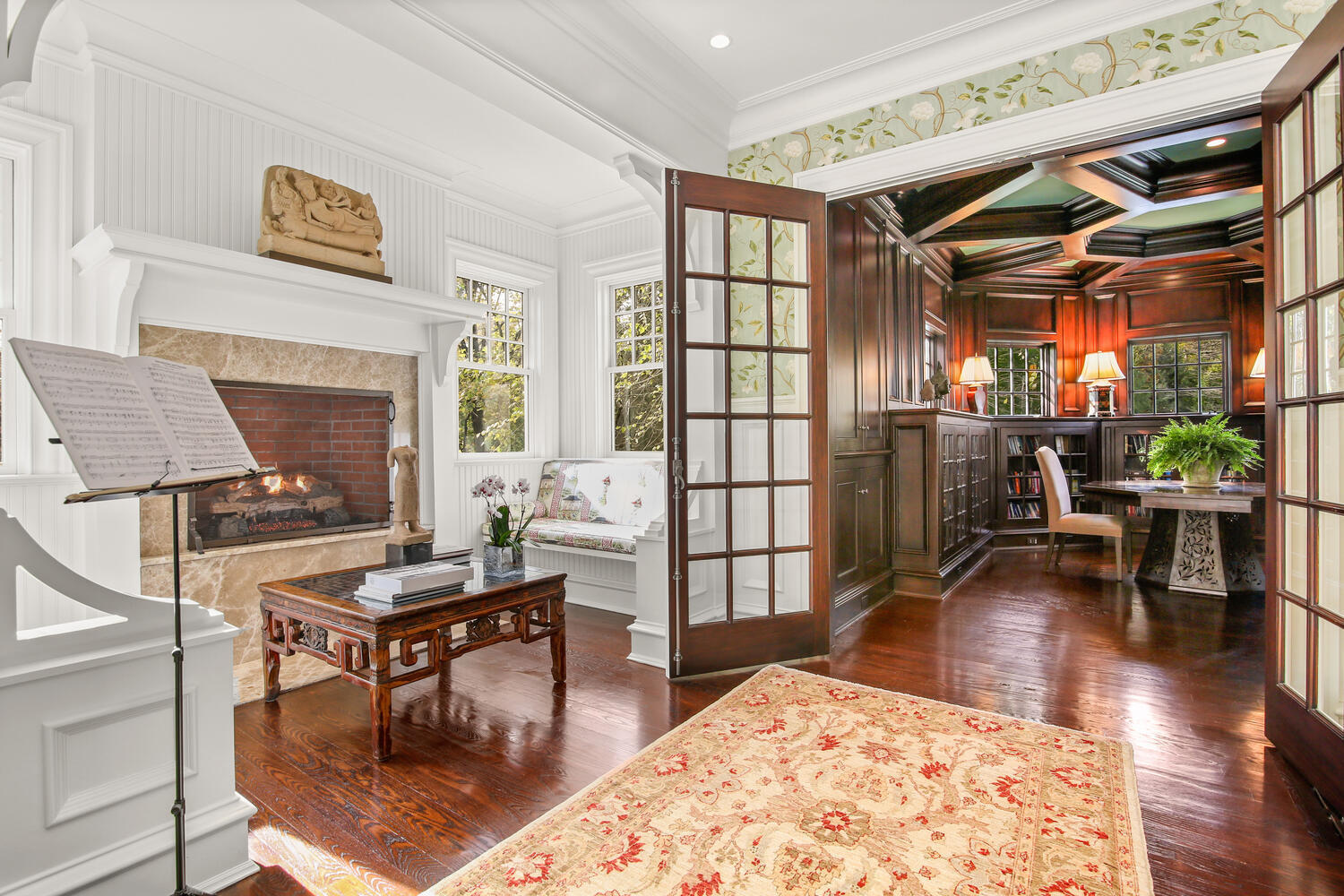 363 West Road New Canaan, CT 06840 - Photo 16 of 68 a living room with furniture a fireplace and wooden floor