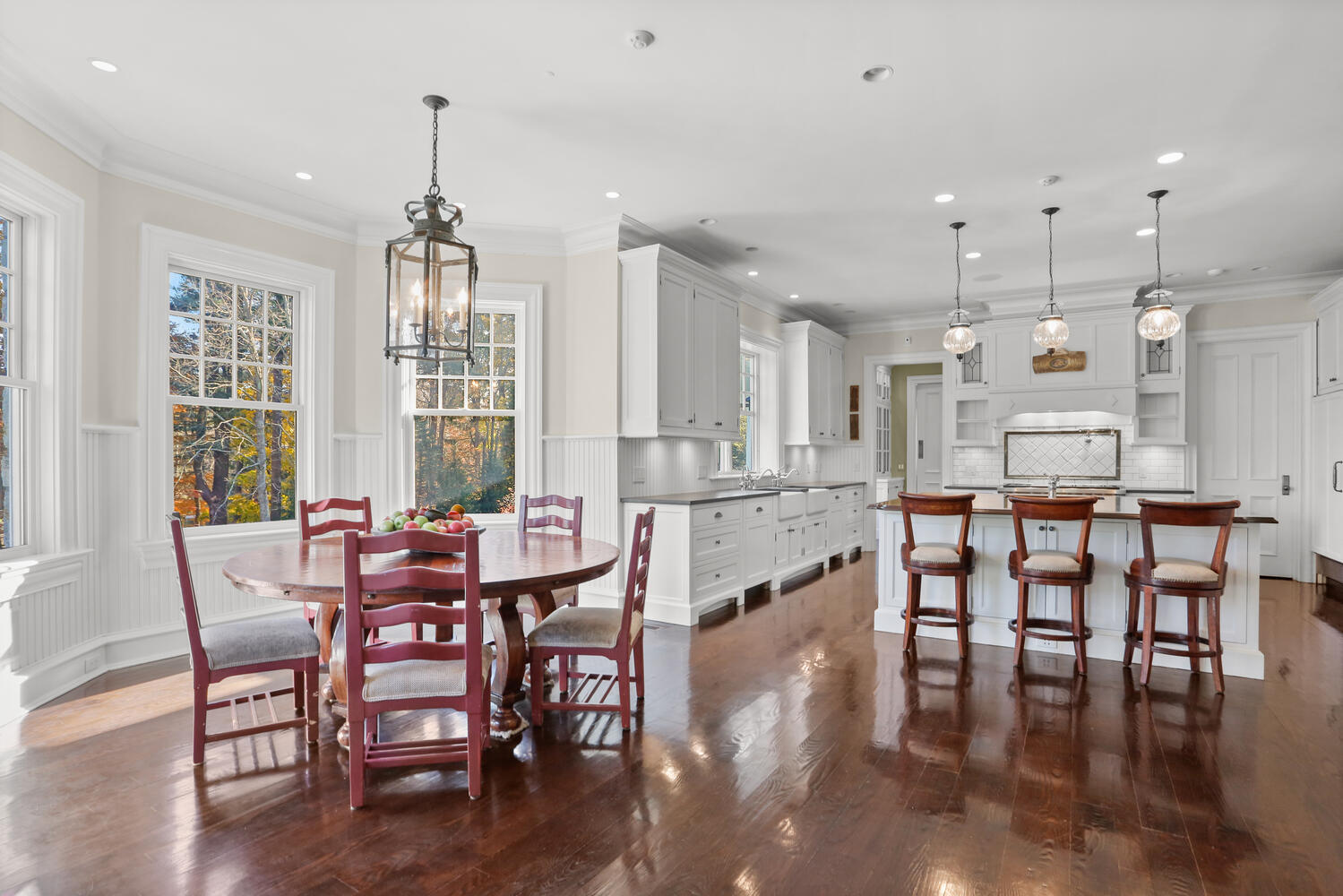 363 West Road New Canaan, CT 06840 - Photo 22 of 68 a view of a dining room with furniture and wooden floor
